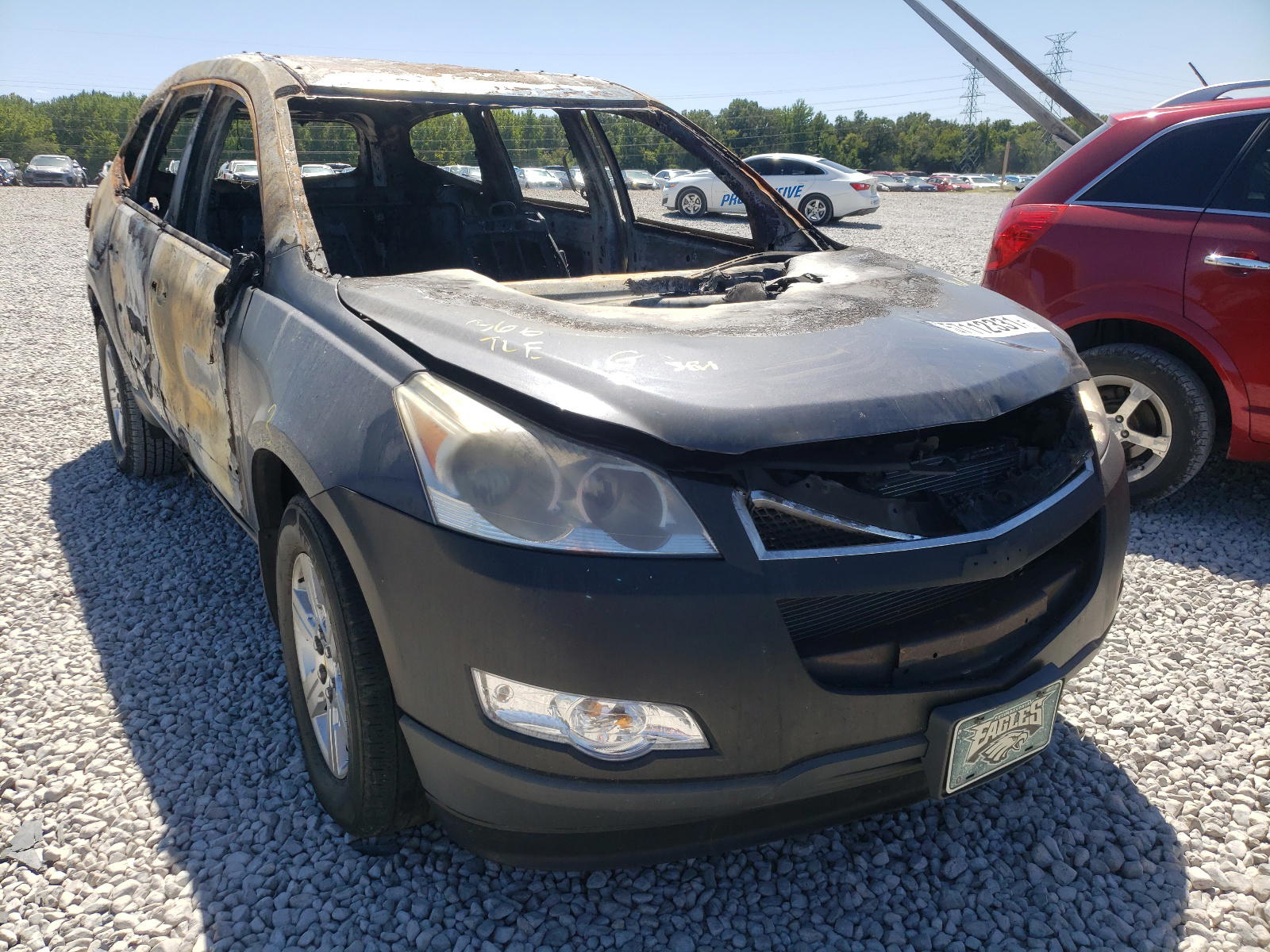 CHEVROLET TRAVERSE L 2012 with VIN 1GNKRFED9CJ400447 - Photo from auction