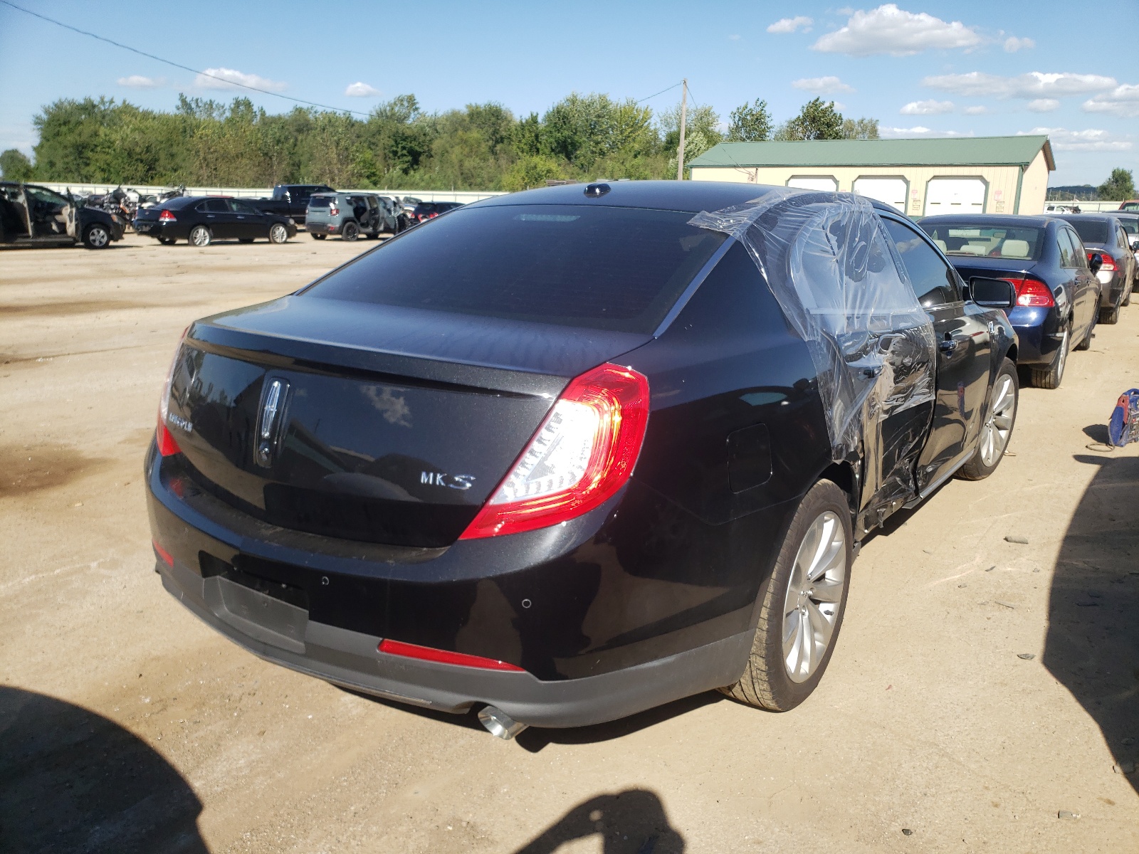 Photo 4 from auction – 2014 LINCOLN MKS with VIN 1LNHL9DK0EG605608