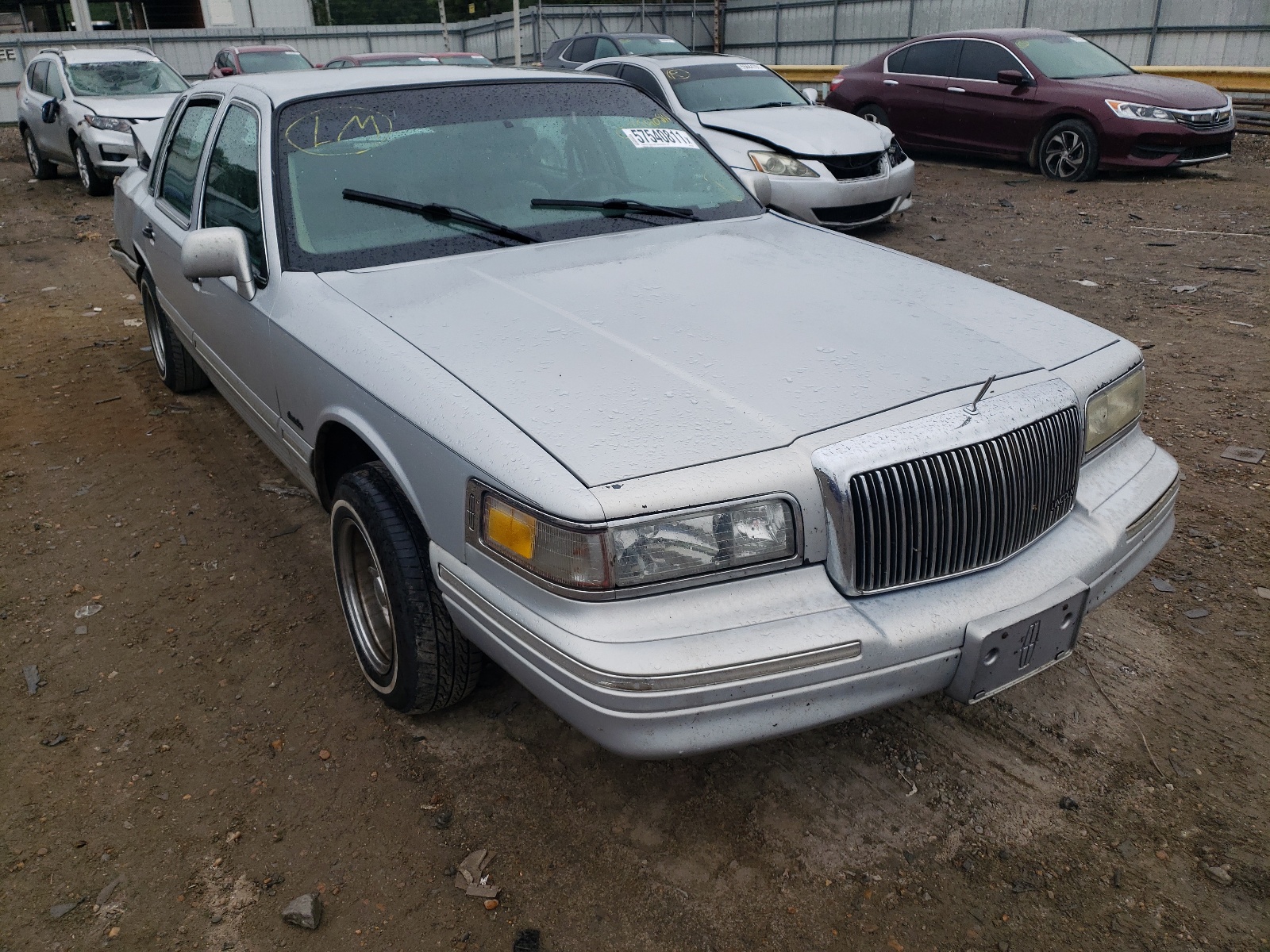 Photo 1 from auction – 1997 LINCOLN TOWN CAR E with VIN 1LNLM81W2VY672598