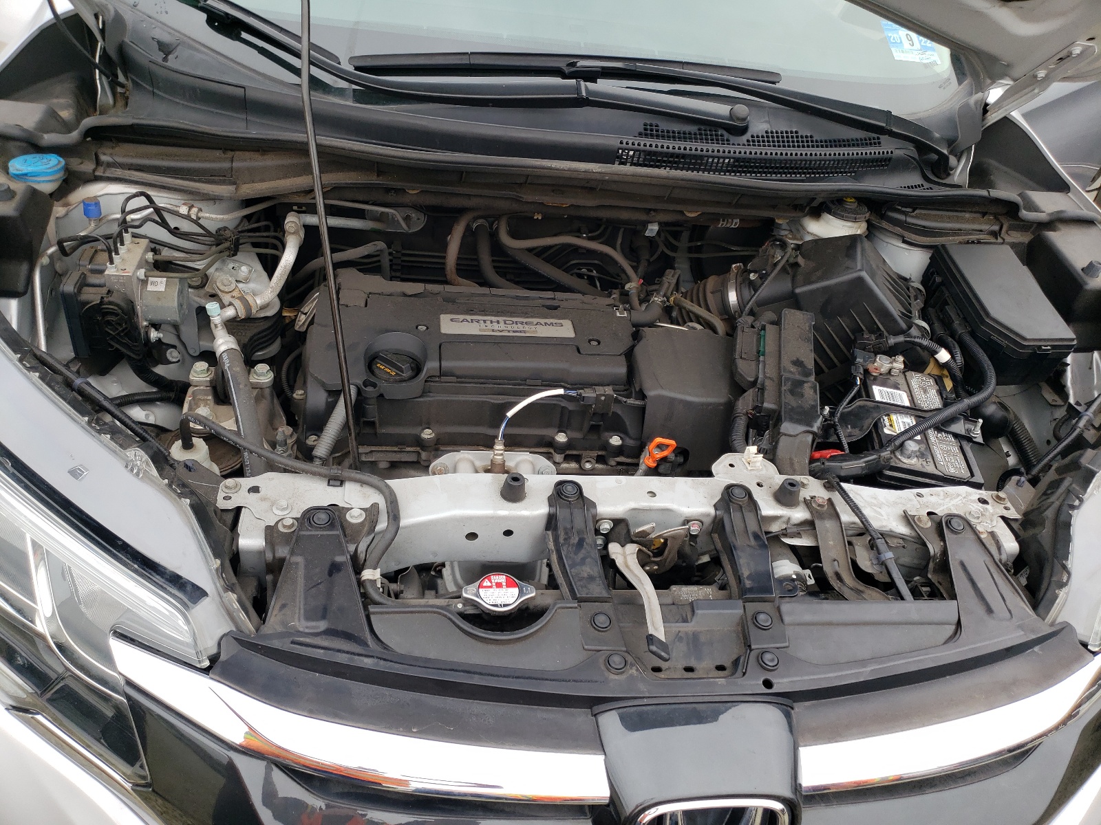Photo 7 from auction – 2015 HONDA CR-V LX with VIN 2HKRM4H34FH696536