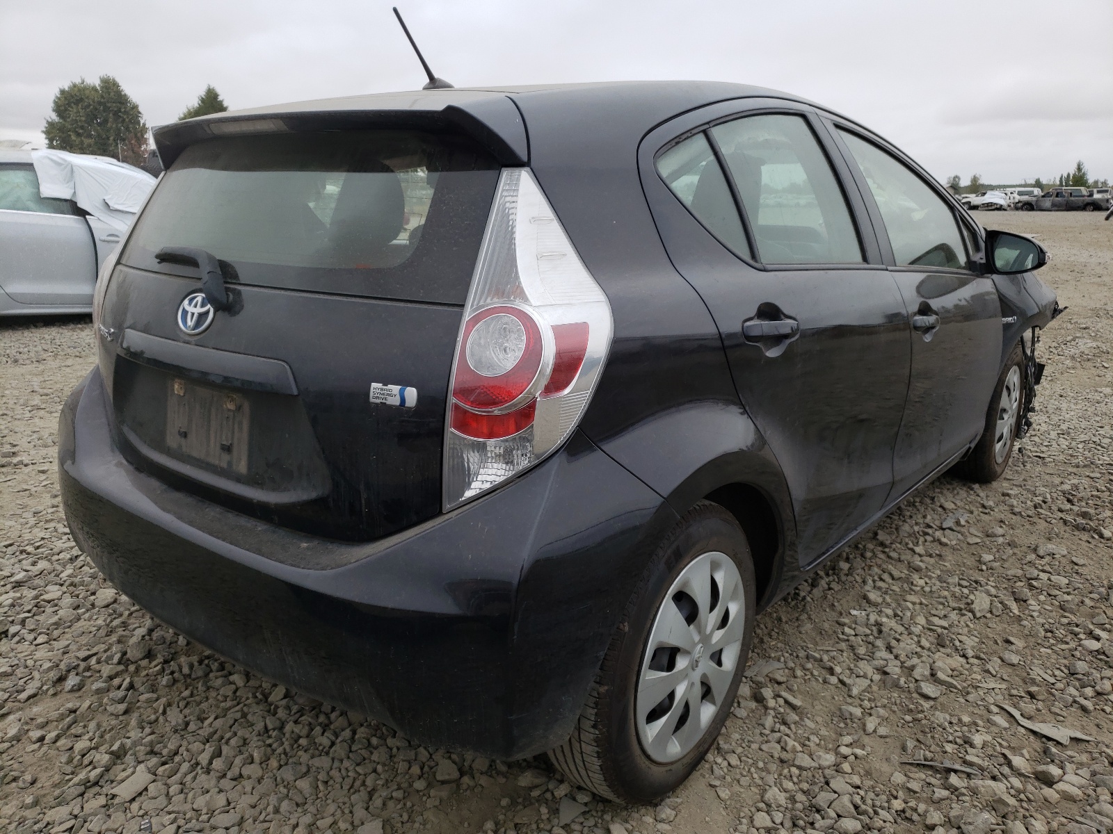 Photo 4 from auction – 2014 TOYOTA PRIUS C with VIN JTDKDTB31E1563226