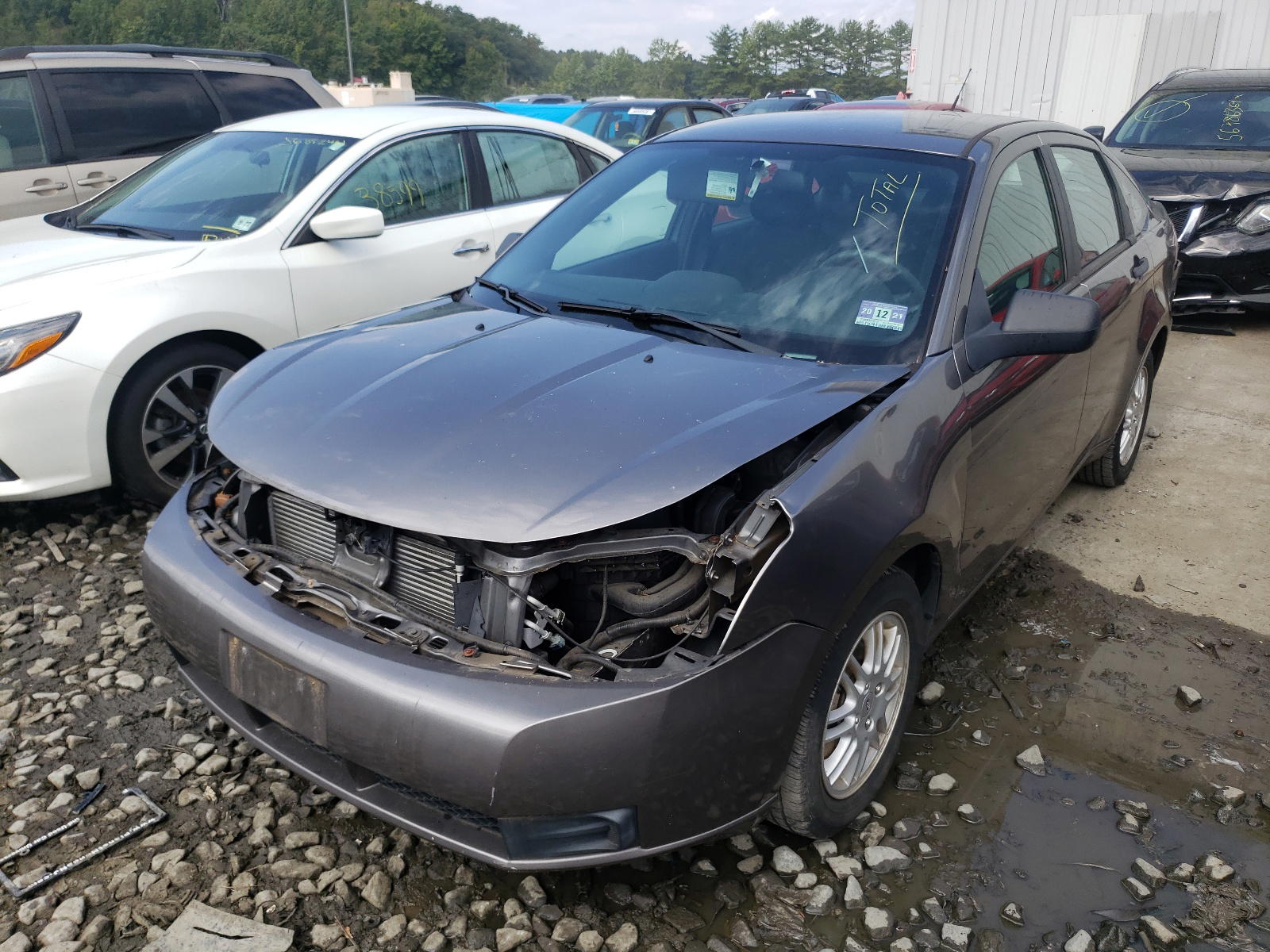 Photo 2 from auction – 2011 FORD FOCUS SE with VIN 1FAHP3FN8BW139642