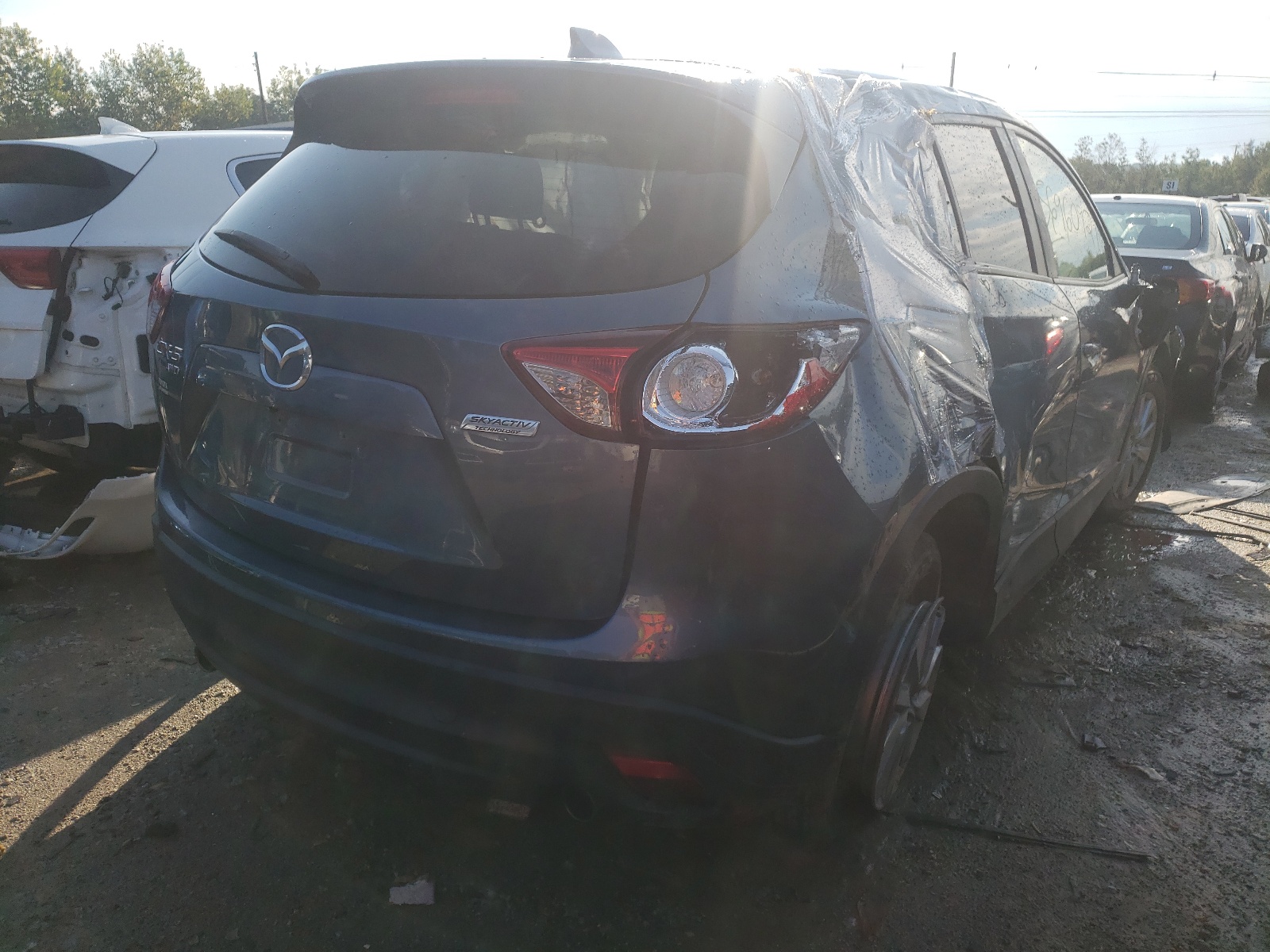 Photo 4 from auction – 2015 MAZDA CX-5 TOURI with VIN JM3KE4CYXF0475299