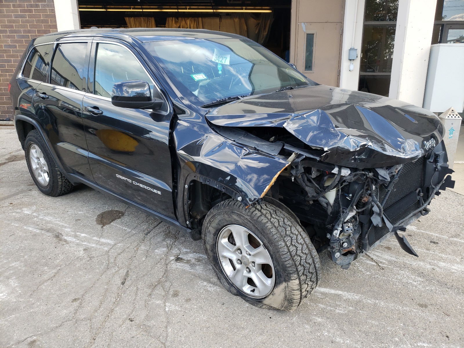 JEEP GRAND CHER 2014 with VIN 1C4RJFAG1EC470790 - Photo from auction