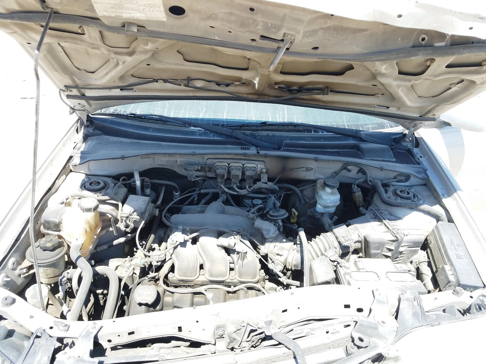 Photo 7 from auction – 2005 MAZDA TRIBUTE S with VIN 4F2YZ06155KM32412