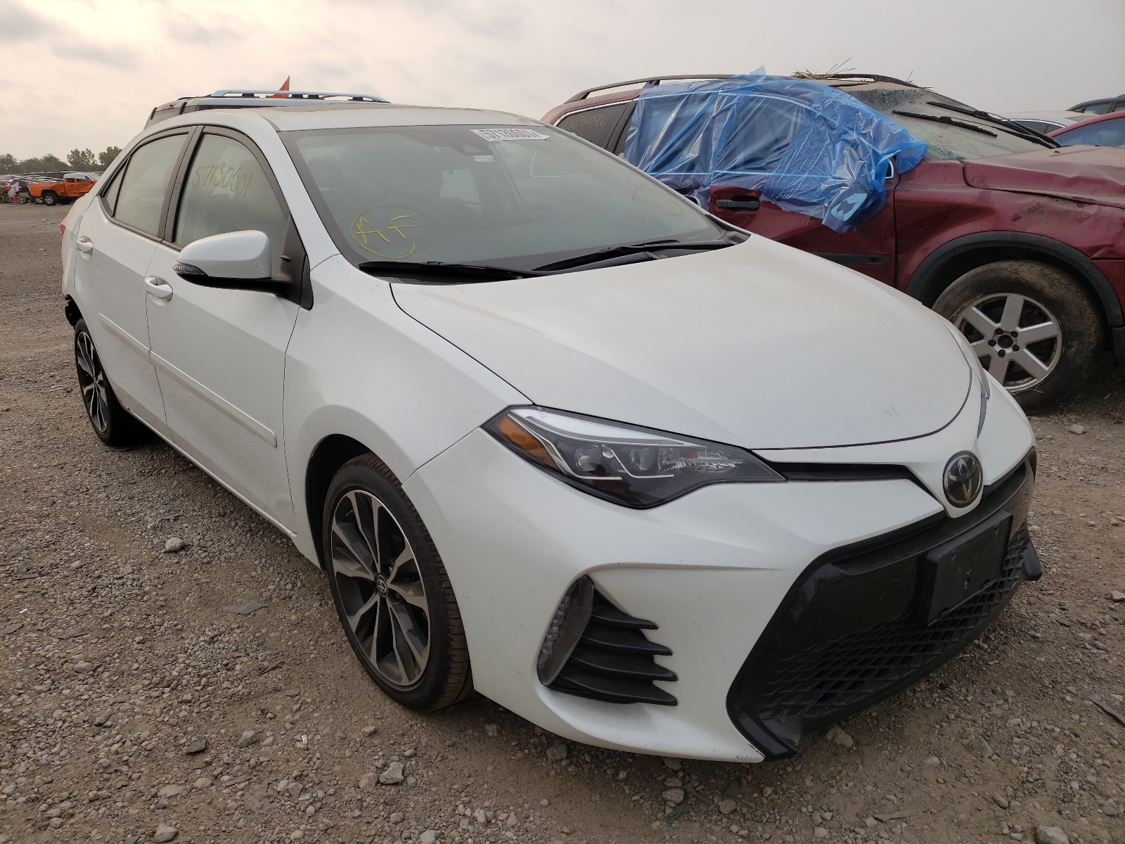 TOYOTA COROLLA L 2018 with VIN 5YFBURHE7JP746910 - Photo from auction