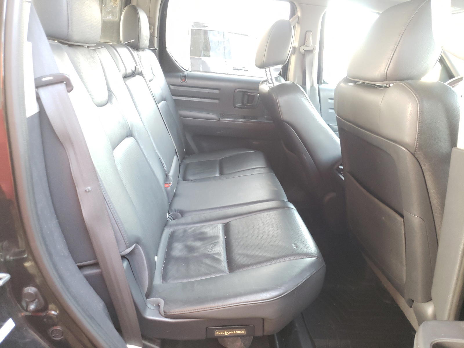 Photo 6 from auction – 2014 HONDA RIDGELINE with VIN 5FPYK1F61EB005786
