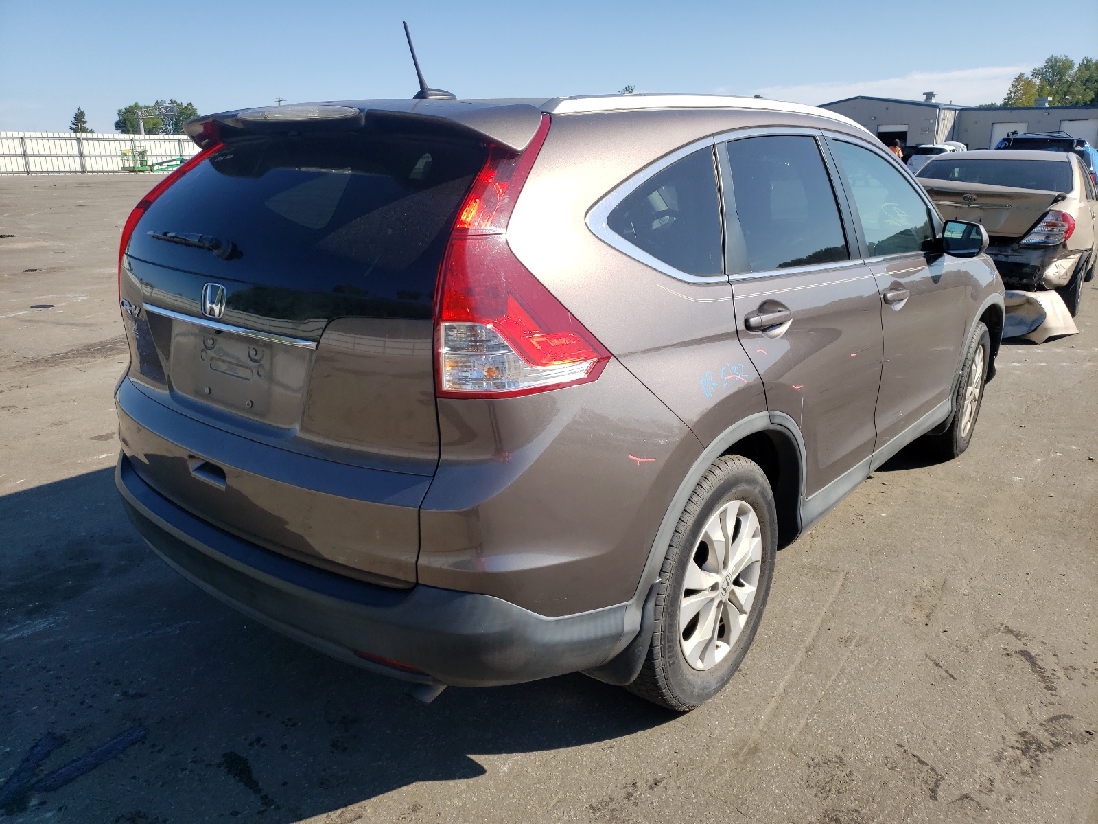 Photo 4 from auction – 2014 HONDA CR-V EXL with VIN 2HKRM3H79EH560480