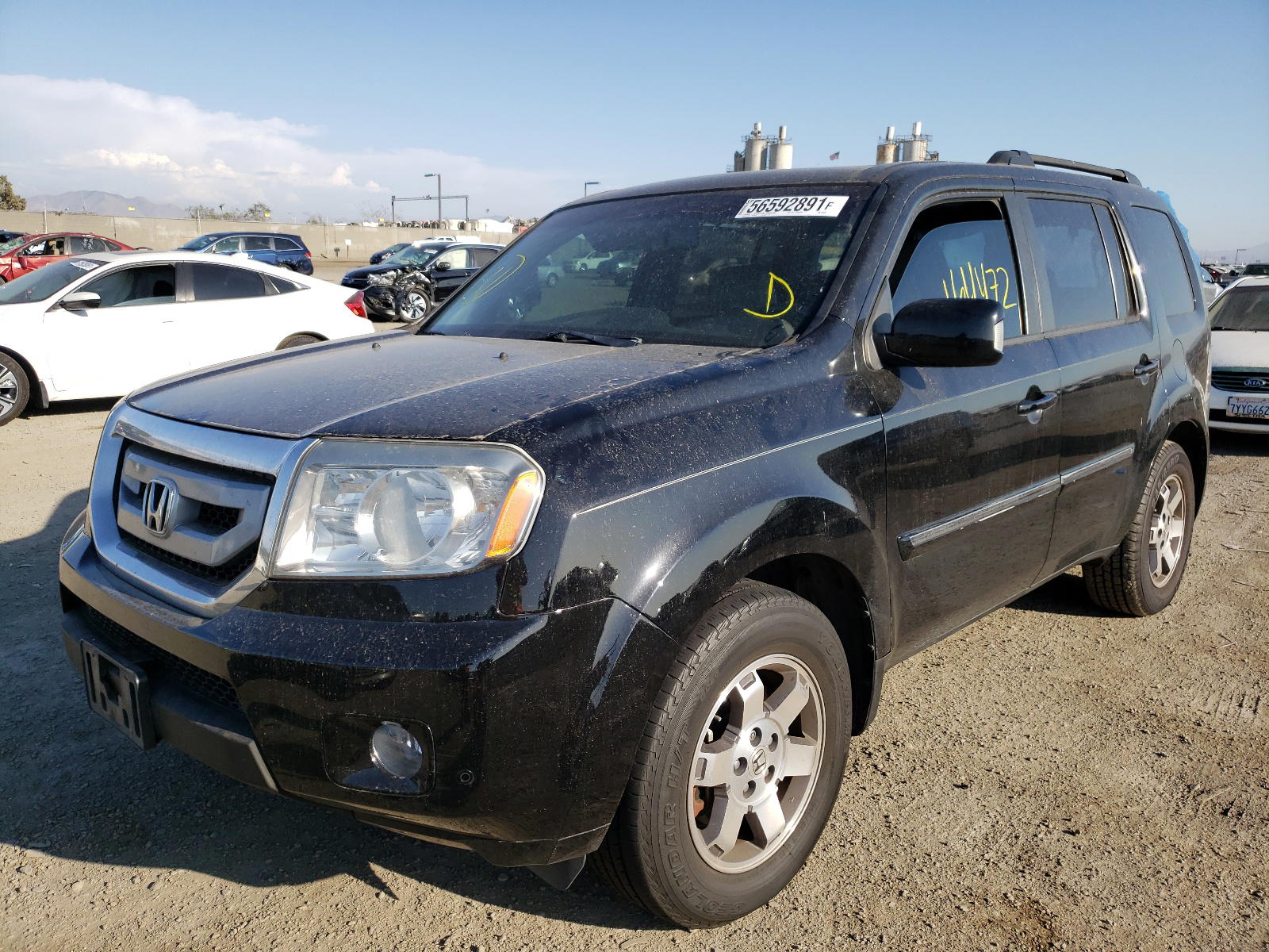 Photo 2 from auction – 2011 HONDA PILOT TOUR with VIN 5FNYF4H95BB083165