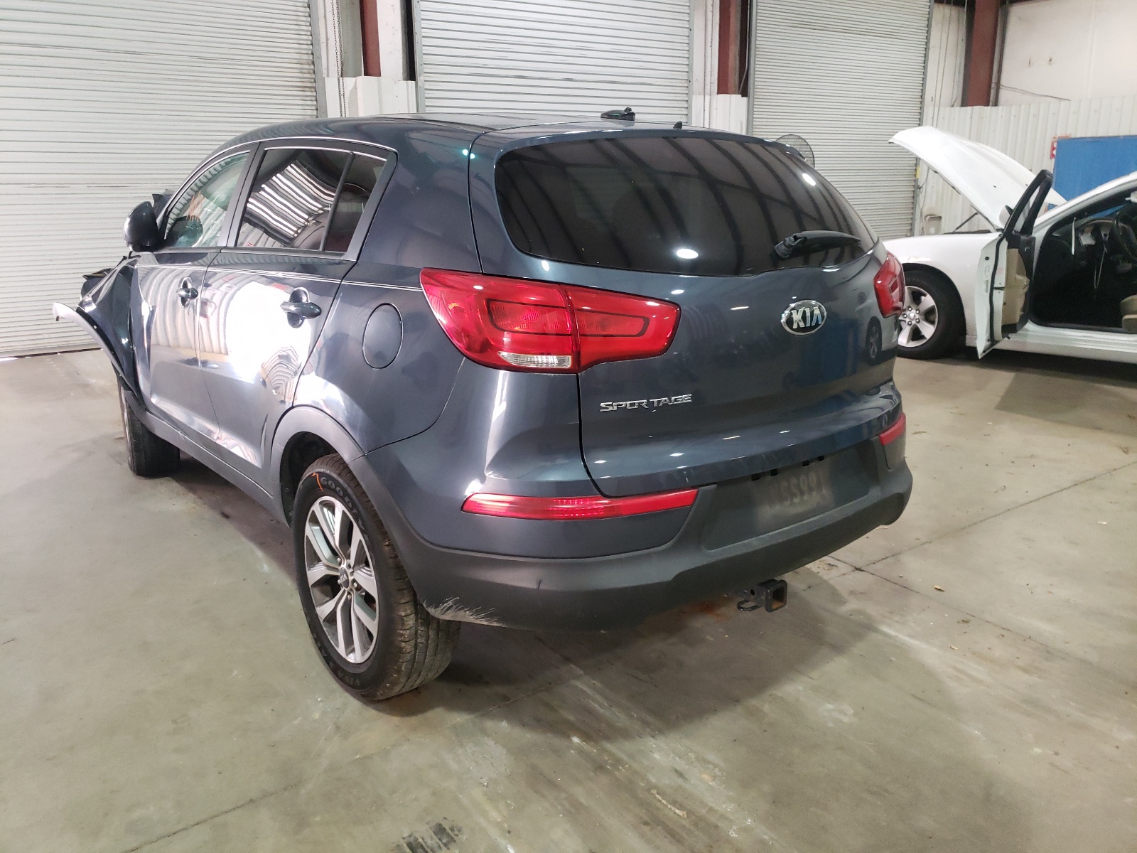 Photo 3 from auction – 2015 KIA SPORTAGE L with VIN KNDPB3AC9F7699454