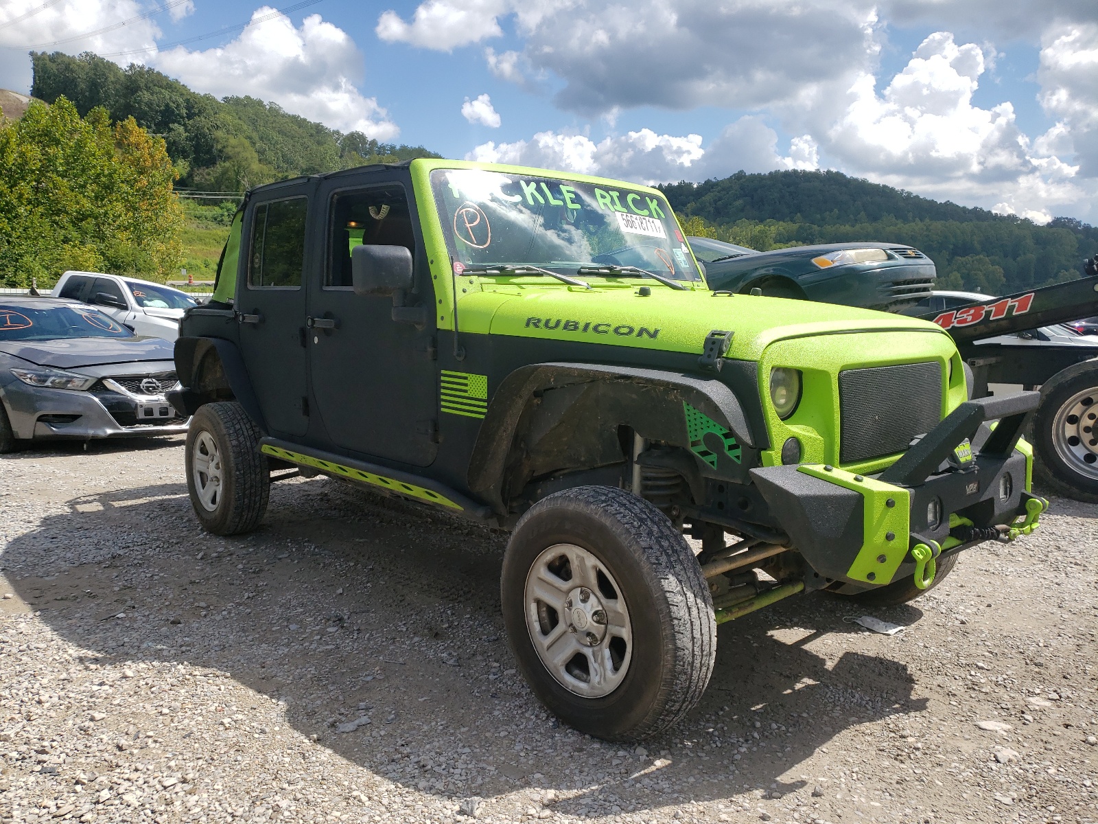 JEEP WRANGLER U 2012 with VIN 1C4HJWFG3CL104220 - Photo from auction