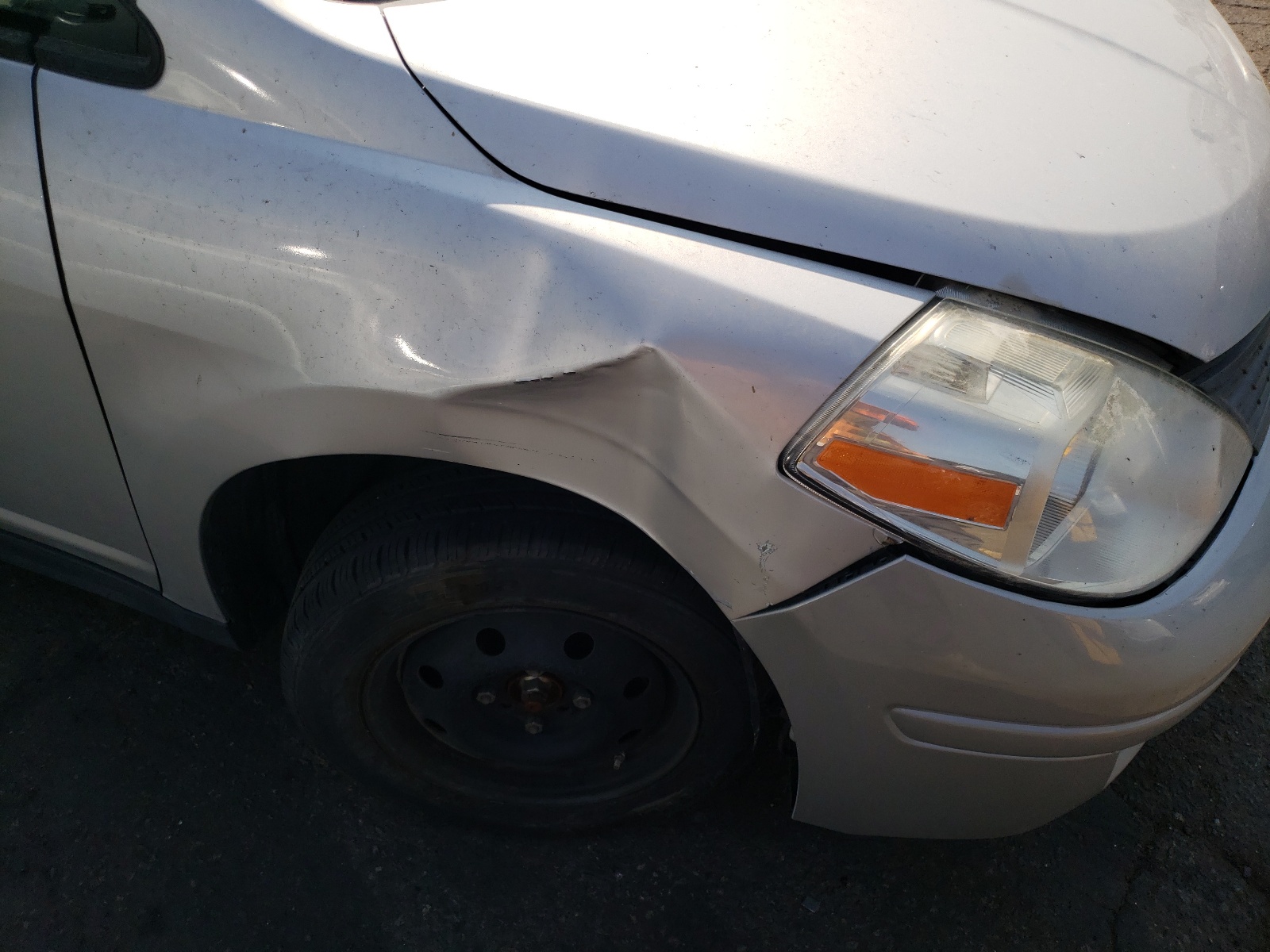 Photo 9 from auction – 2009 NISSAN VERSA S with VIN 3N1CC11E99L454433