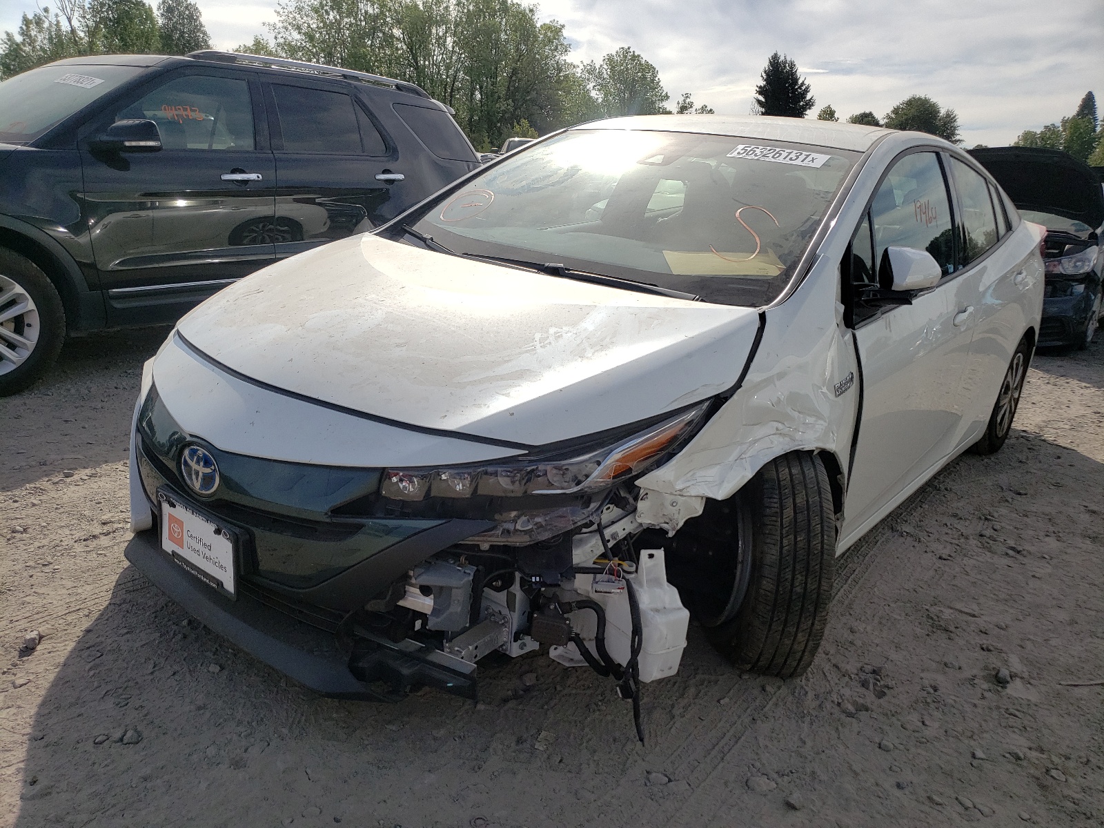 Photo 2 from auction – 2018 TOYOTA PRIUS PRIM with VIN JTDKARFP6J3071699
