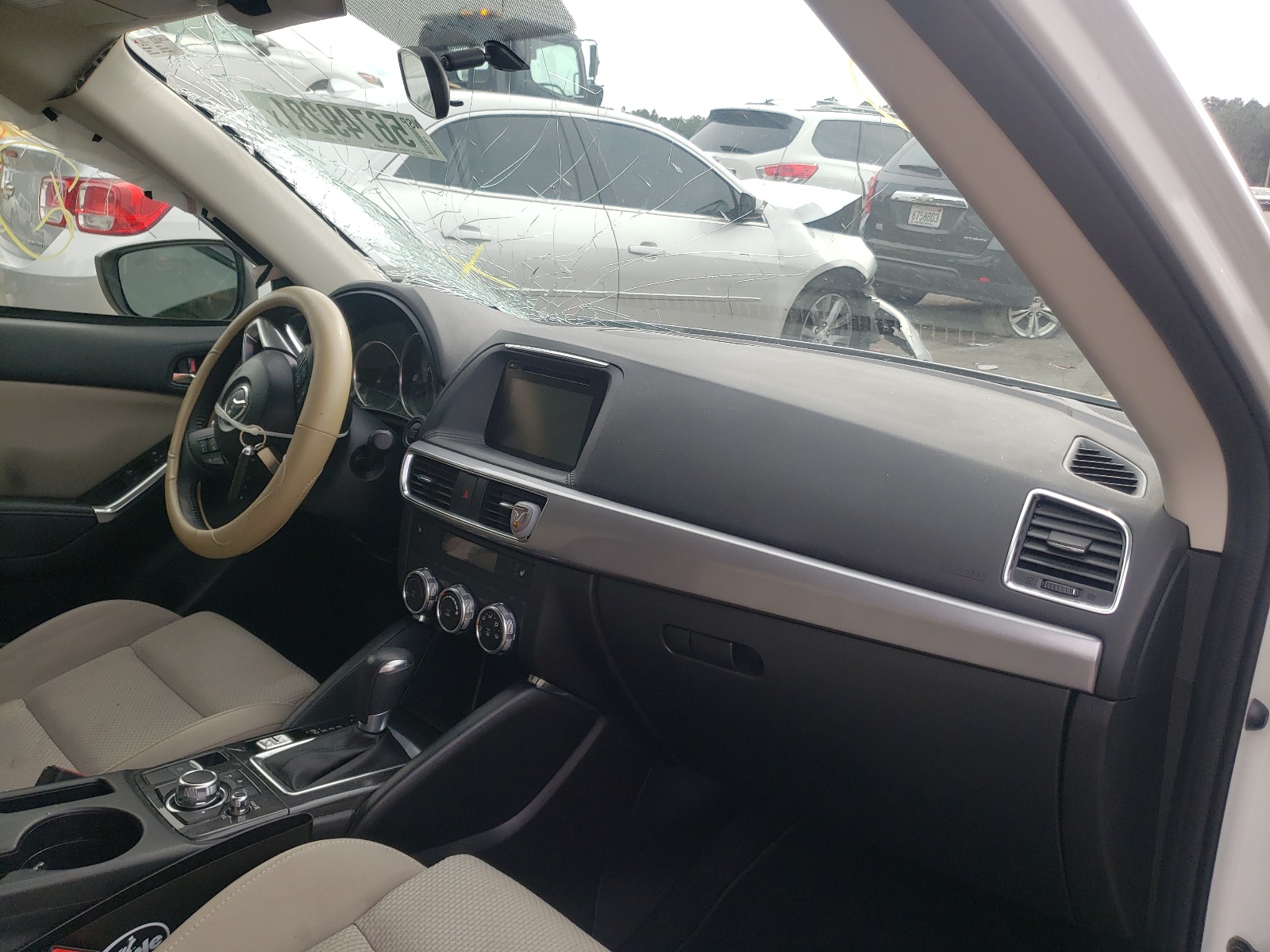 Photo 9 from auction – 2016 MAZDA CX-5 TOURI with VIN JM3KE2CYXG0870492
