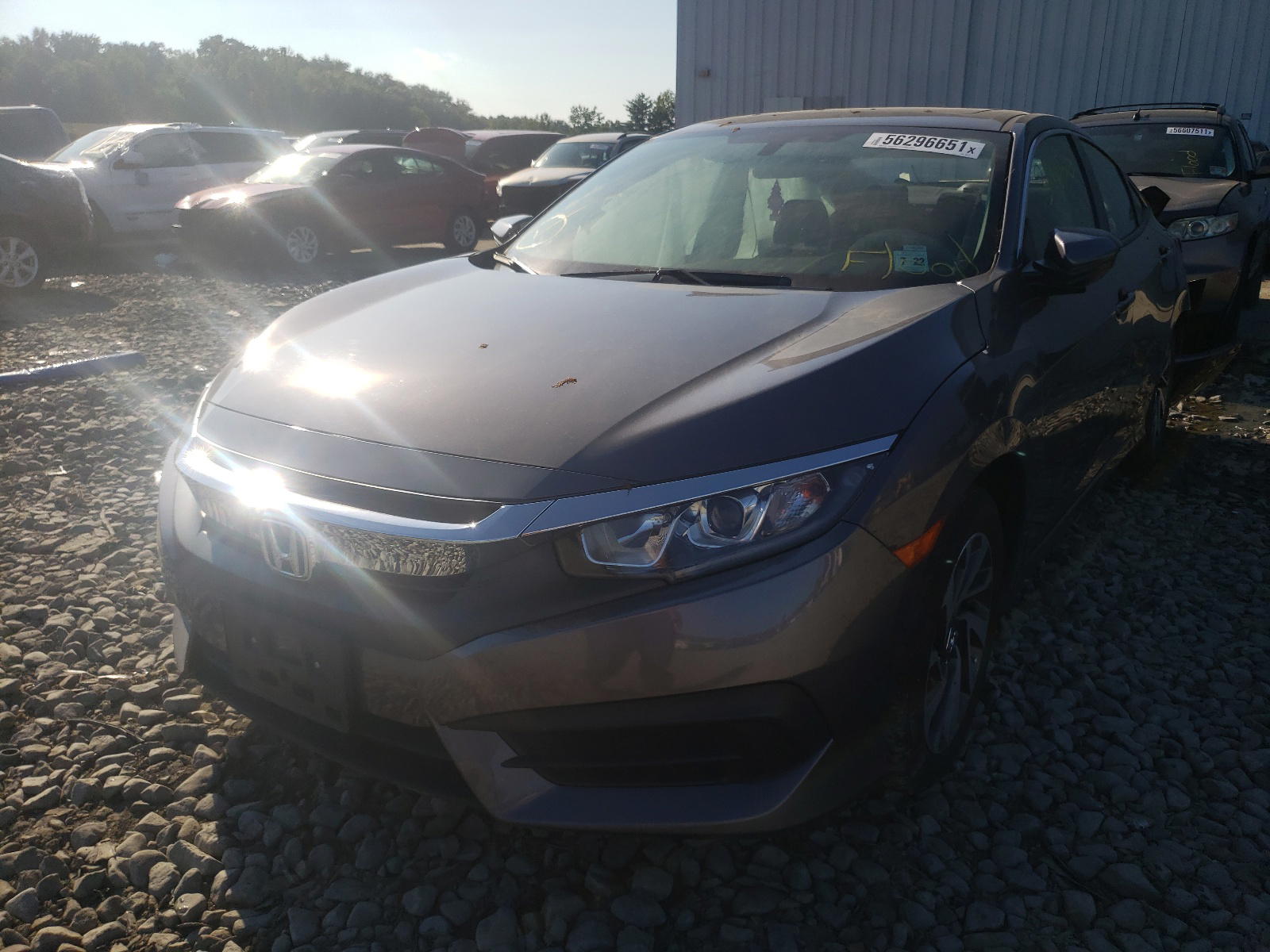 Photo 2 from auction – 2017 HONDA CIVIC EX with VIN 2HGFC2F74HH550277