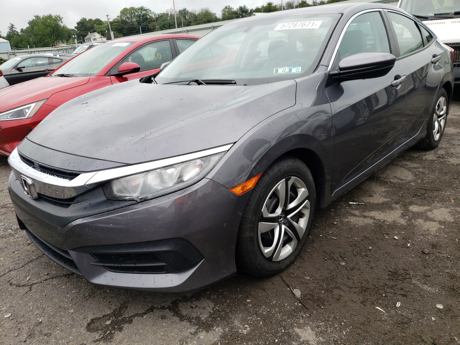 Photo 2 from auction – 2018 HONDA CIVIC LX with VIN 2HGFC2F58HH540012