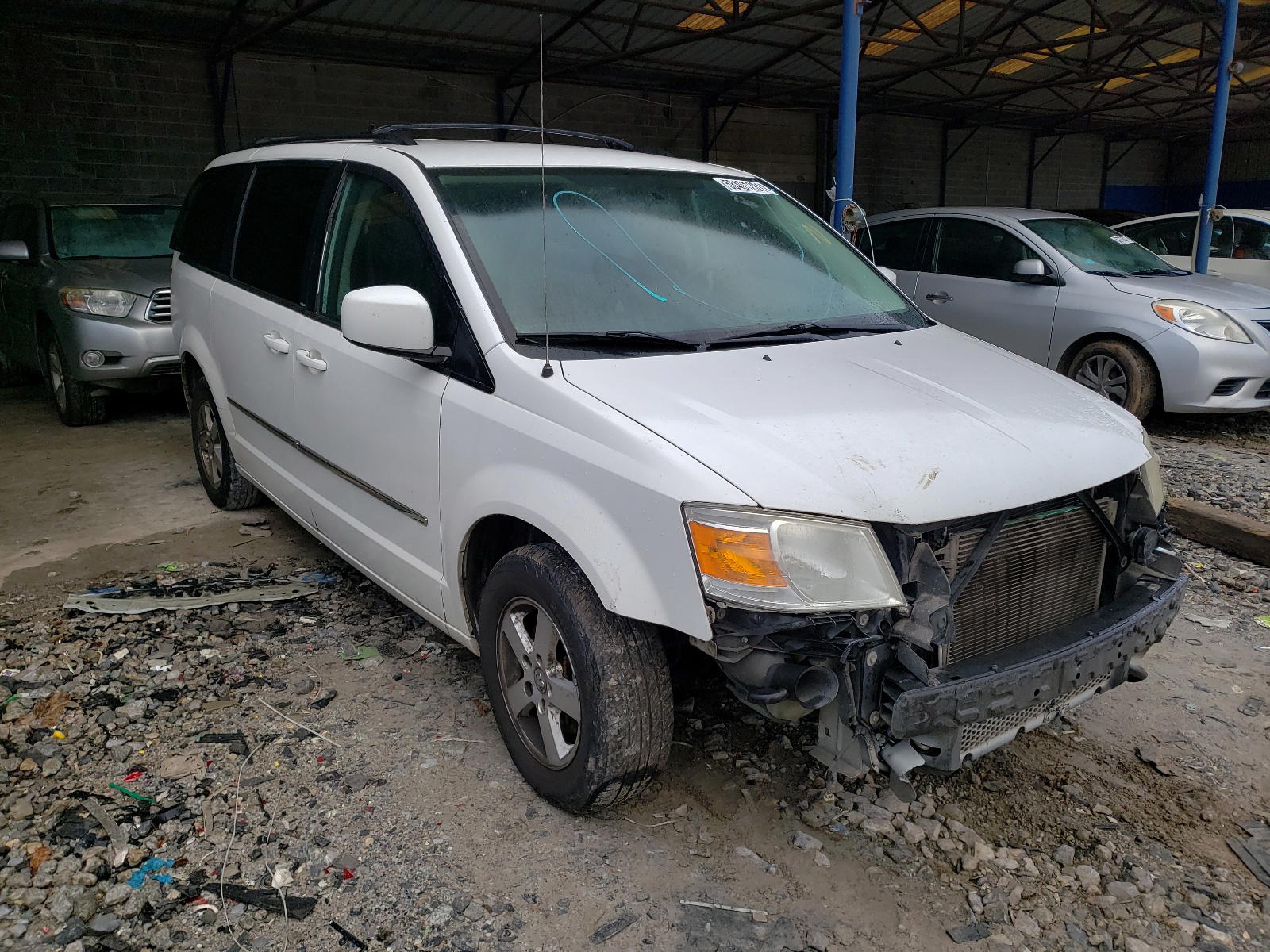 DODGE GRAND CARA 2010 with VIN 2D4RN5D11AR197117 - Photo from auction