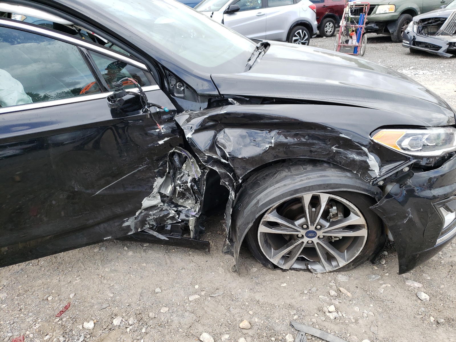 Photo 9 from auction – 2020 FORD FUSION TIT with VIN 3FA6P0D99LR193385