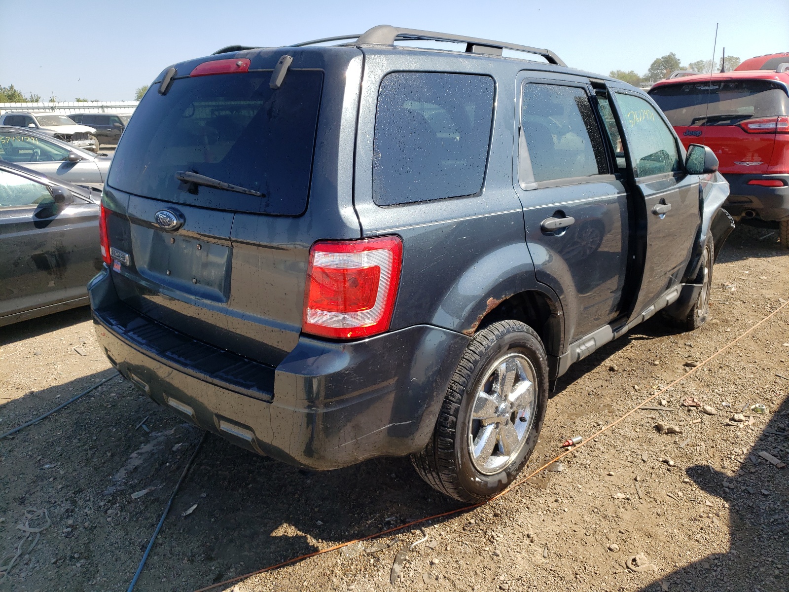 Photo 4 from auction – 2009 FORD ESCAPE XLT with VIN 1FMCU03G29KB01158