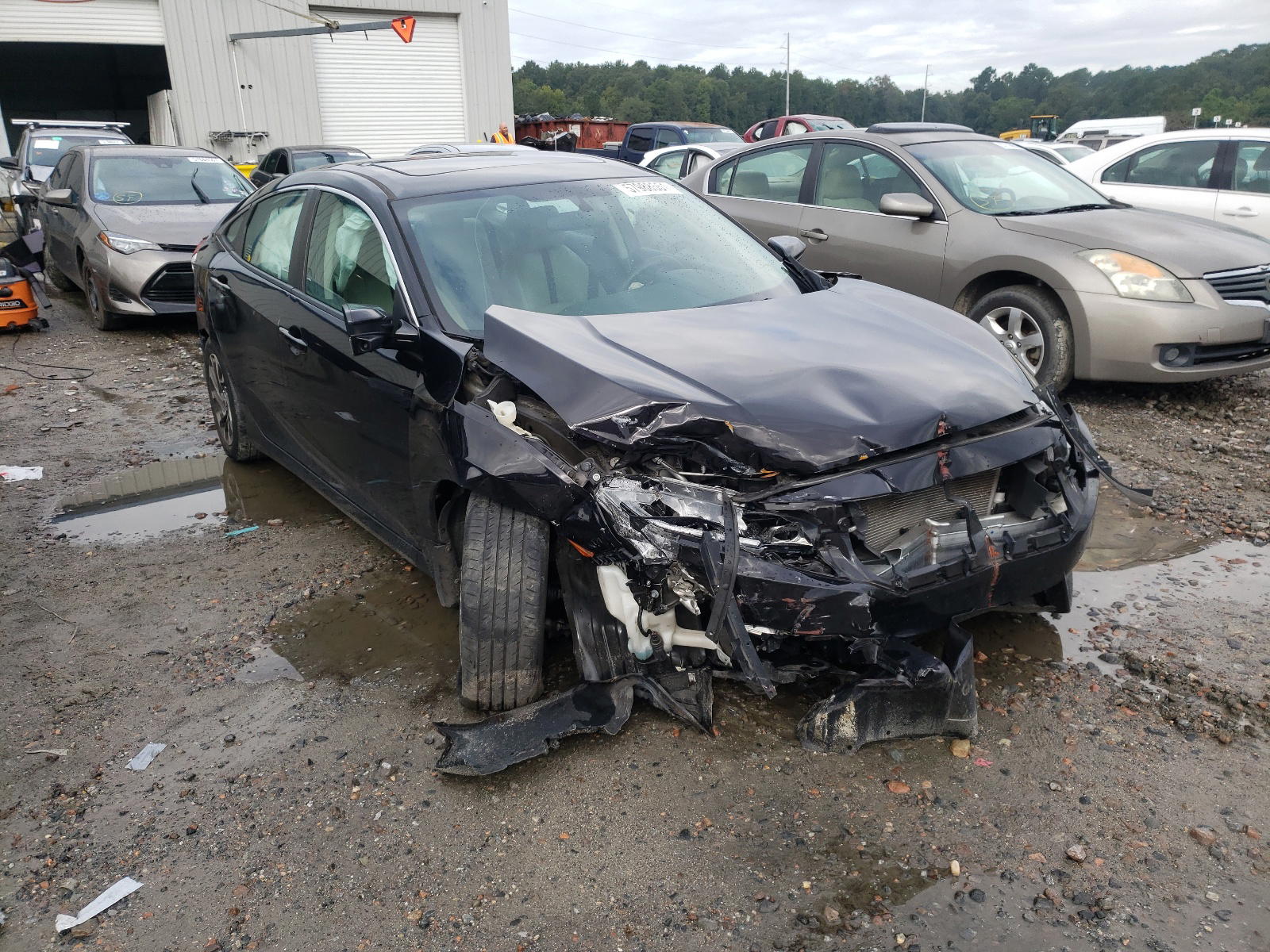 HONDA CIVIC EX 2016 with VIN 19XFC2F73GE086374 - Photo from auction