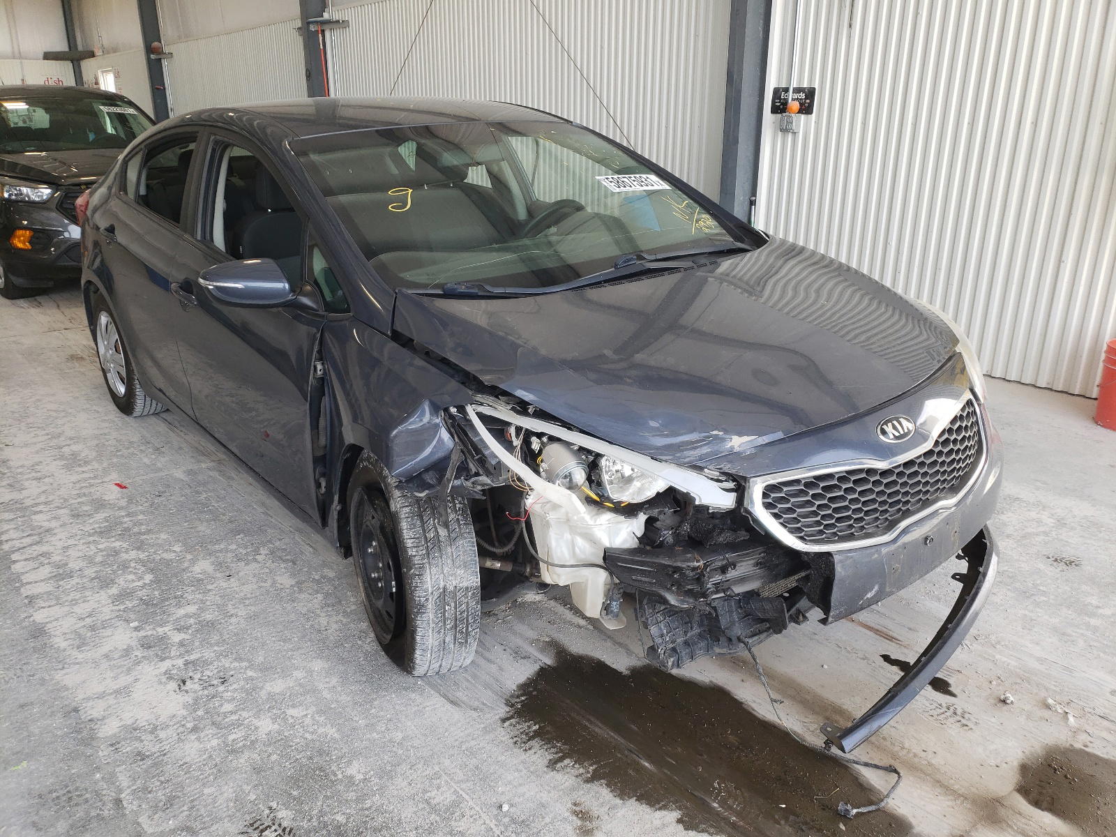 KIA FORTE LX 2015 with VIN KNAFX4A60F5332920 - Photo from auction