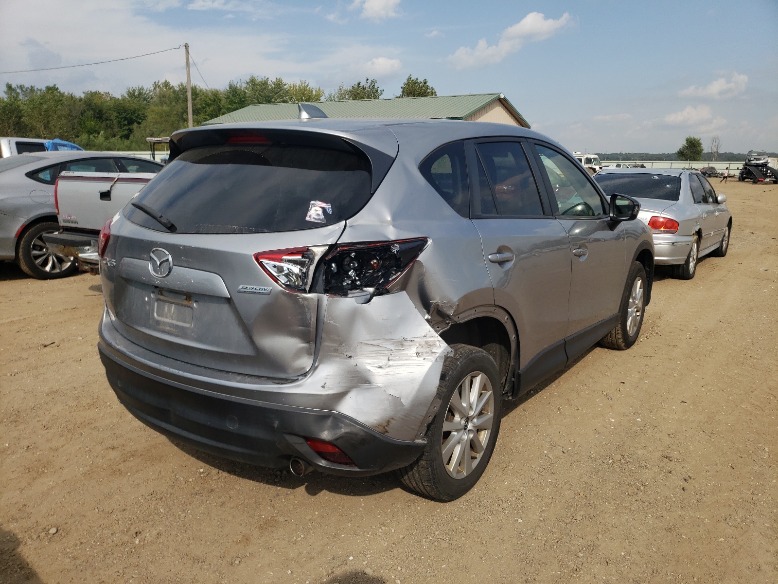 Photo 4 from auction – 2015 MAZDA CX-5 TOURI with VIN JM3KE2CY1F0435231