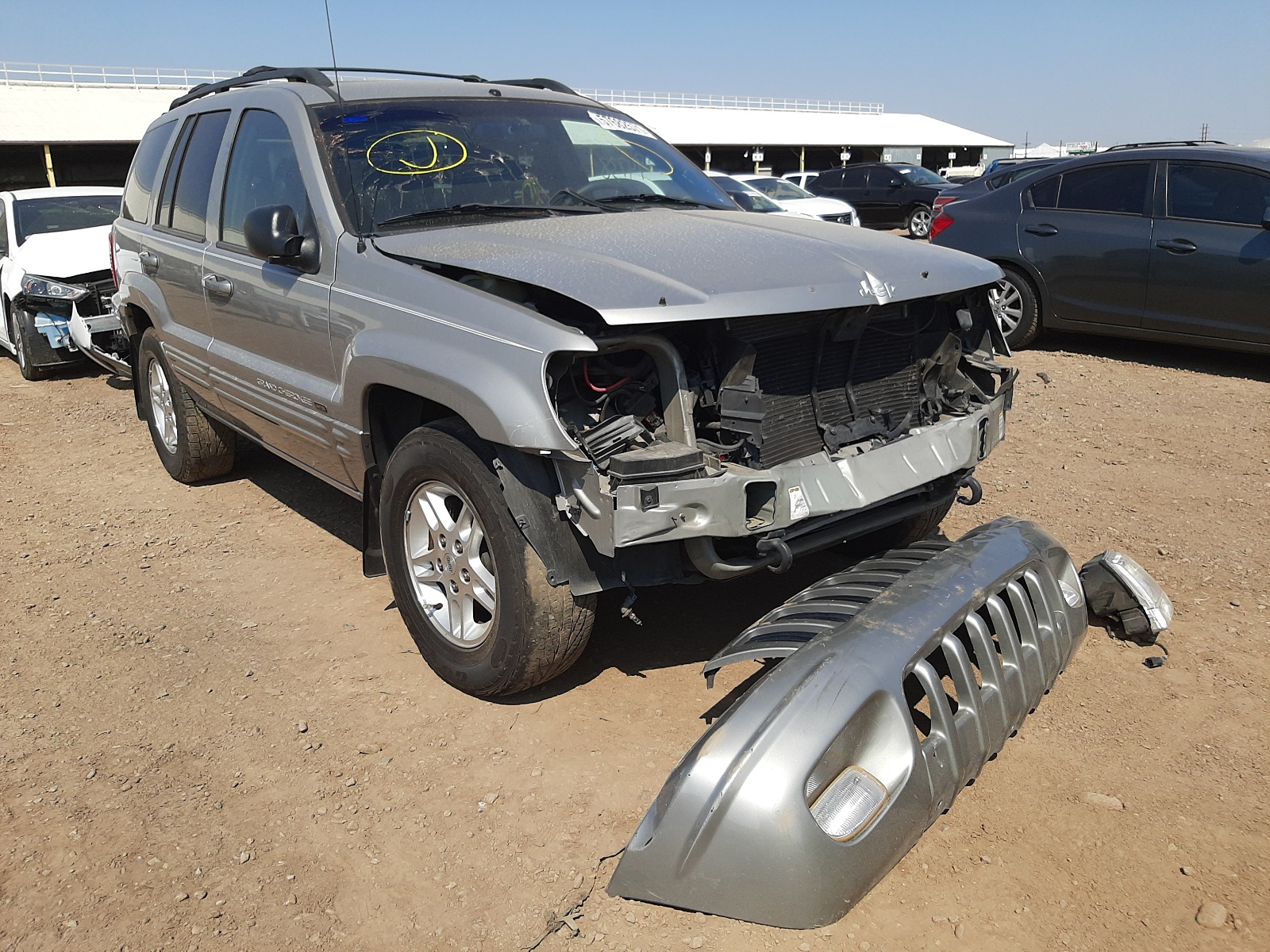 JEEP GRAND CHER 2000 with VIN 1J4GW58N9YC186474 - Photo from auction
