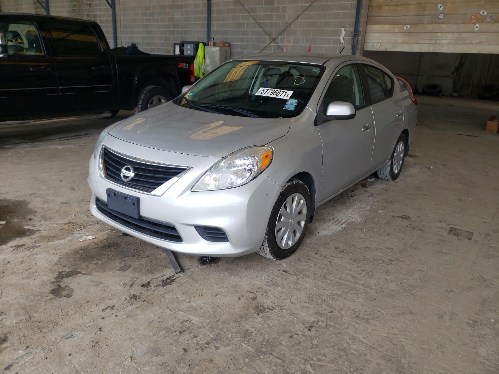 Photo 2 from auction – 2012 NISSAN VERSA S with VIN 3N1CN7AP6CL945211