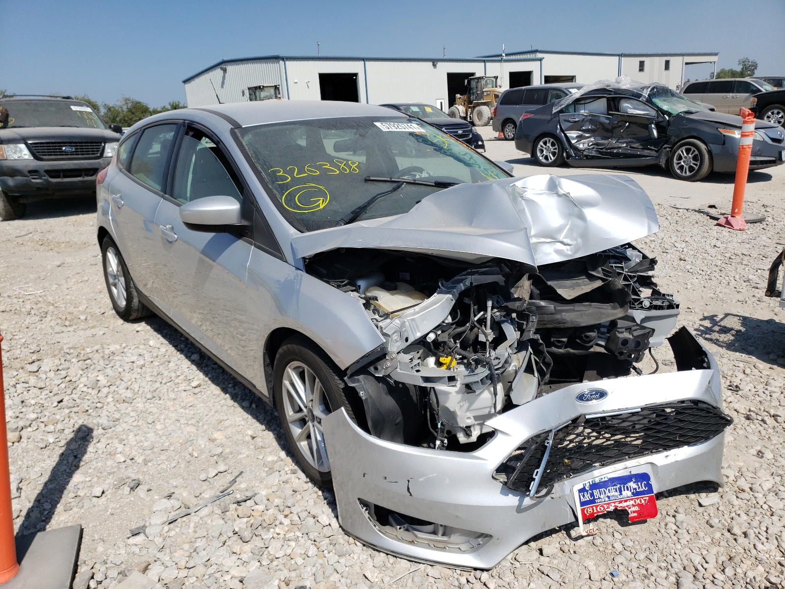 FORD FOCUS SE 2018 with VIN 1FADP3K2XJL326388 - Photo from auction