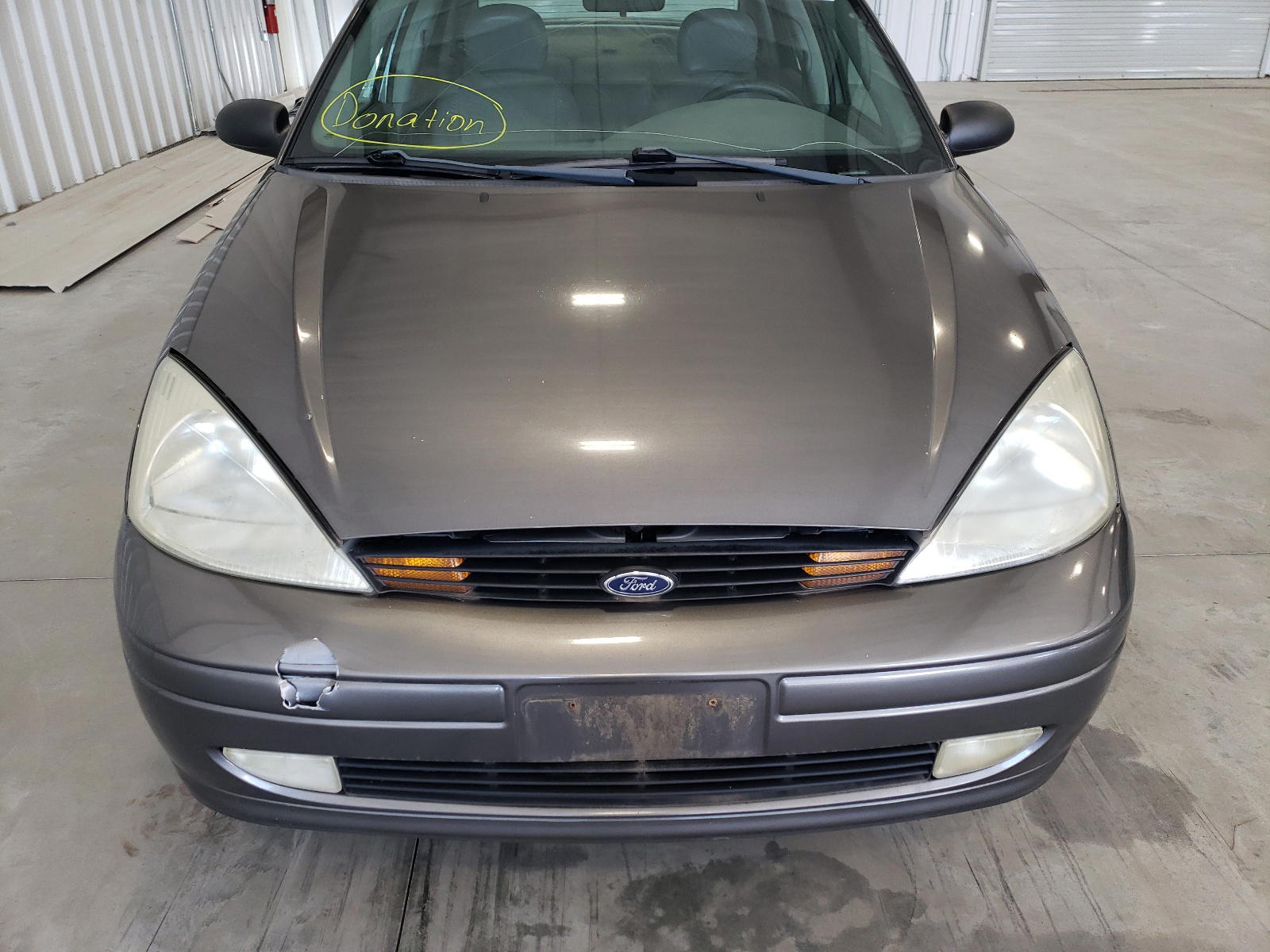Photo 9 from auction – 2002 FORD FOCUS with VIN 1FAFP38312W199054