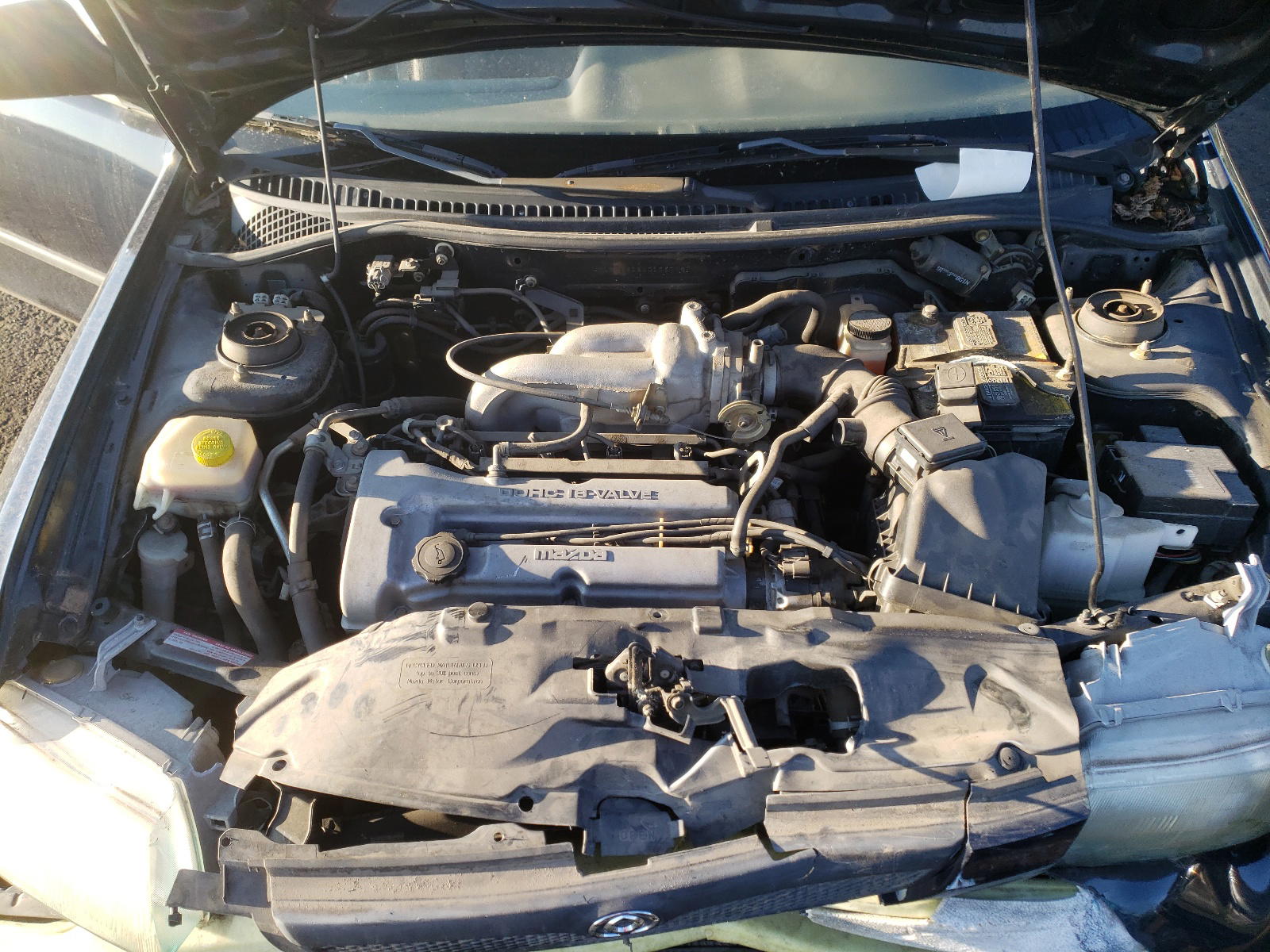 Photo 7 from auction – 1997 MAZDA PROTEGE DX with VIN JM1BC1419V0133775