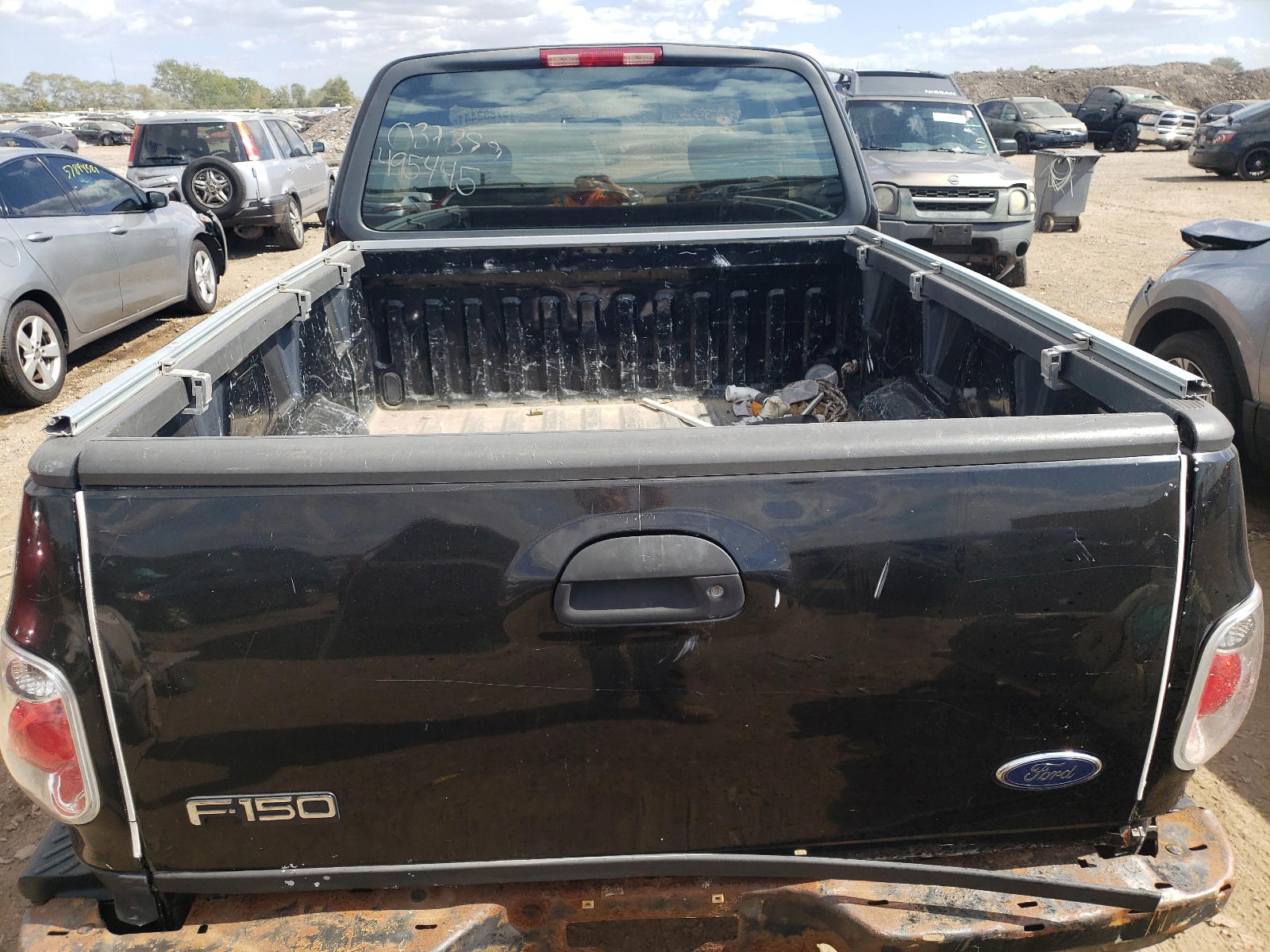 Photo 9 from auction – 2003 FORD F150 with VIN 1FTRX07L93KD65577