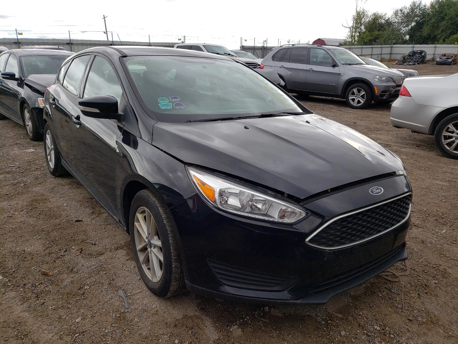 FORD FOCUS SE 2017 with VIN 1FADP3K29HL340969 - Photo from auction