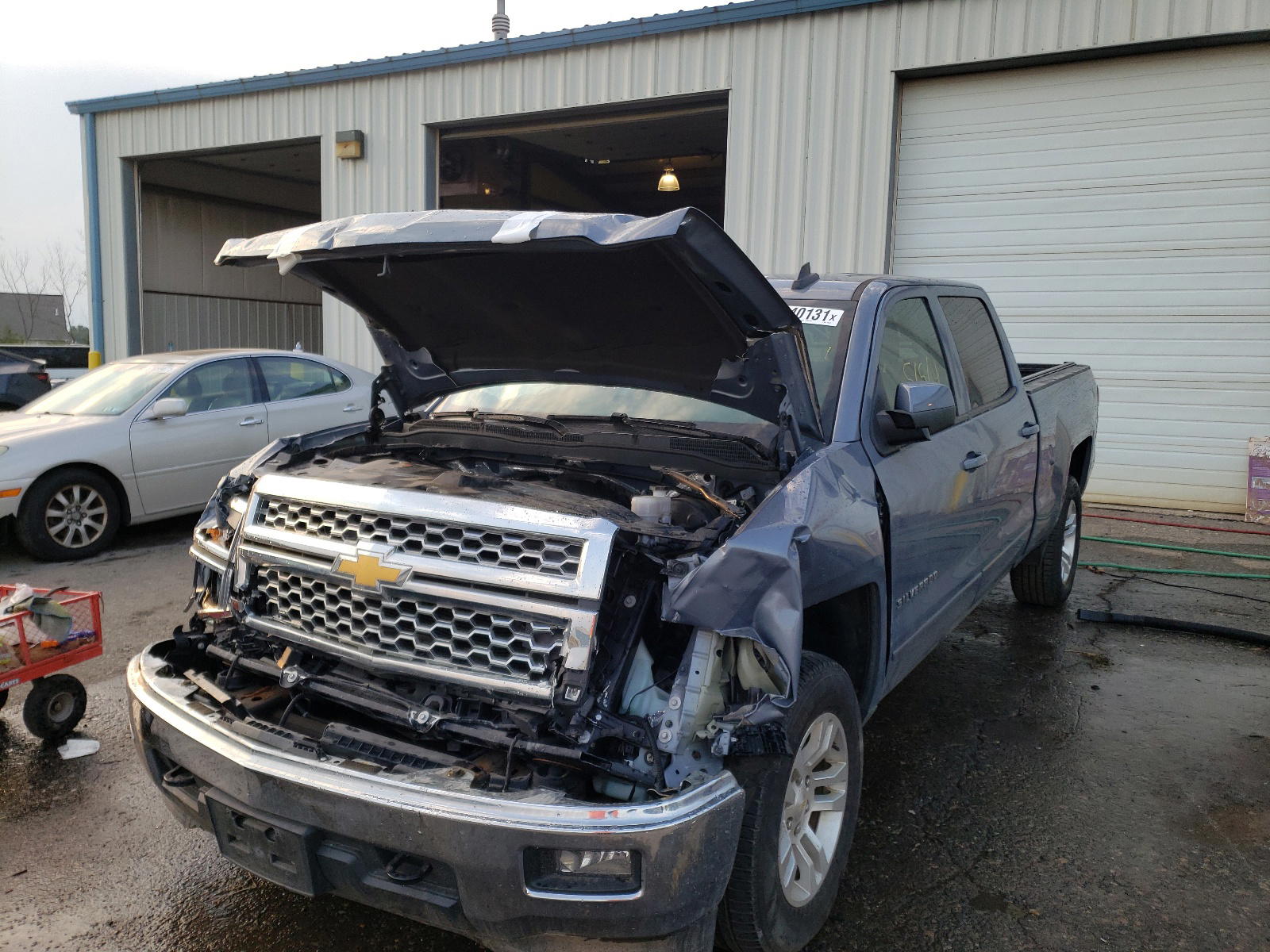 Photo 2 from auction – 2015 CHEVROLET SILVERADO with VIN 1GCUKREC8FF200875