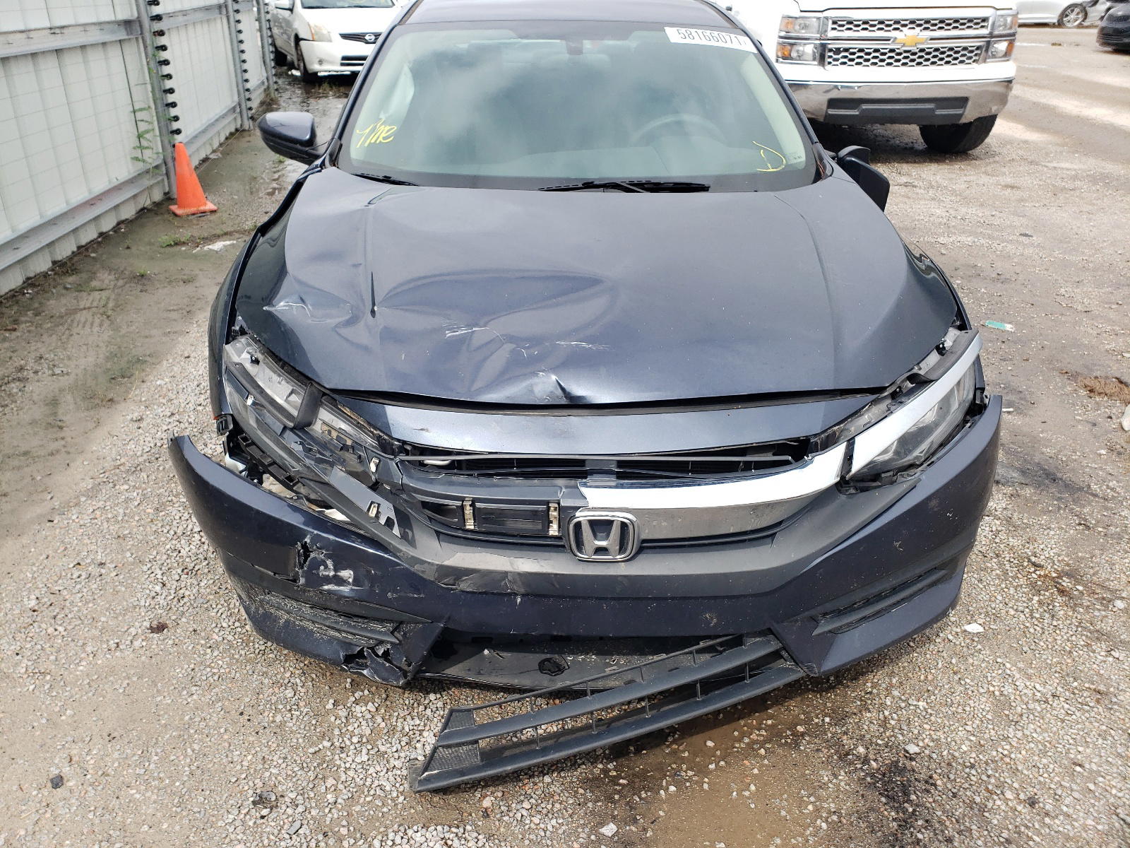 Photo 9 from auction – 2017 HONDA CIVIC LX with VIN 19XFC2F58HE048834