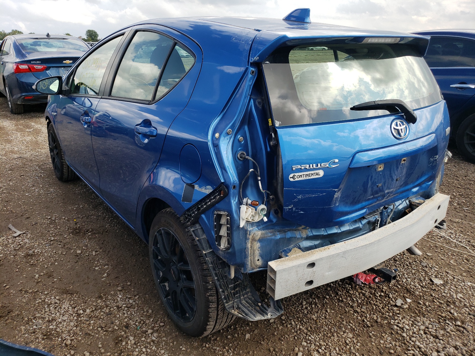Photo 3 from auction – 2015 TOYOTA PRIUS C with VIN JTDKDTB30F1109681