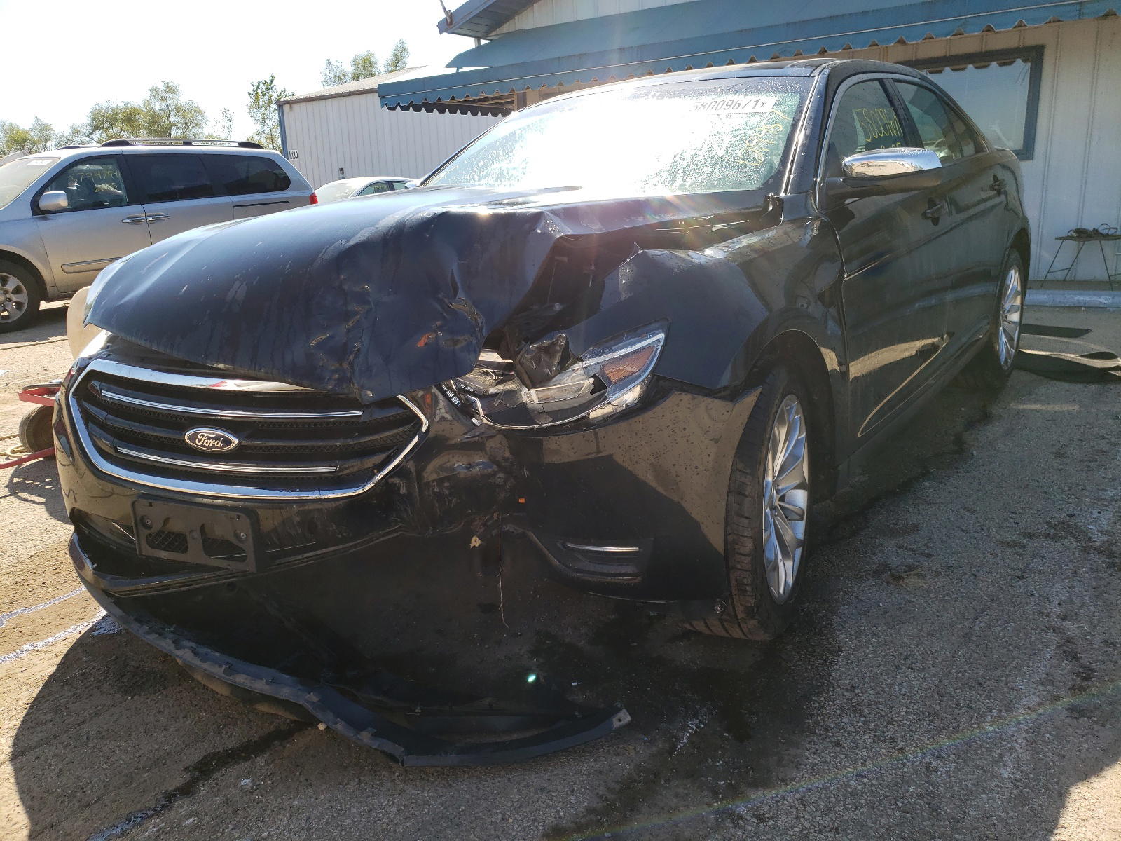 Photo 2 from auction – 2013 FORD TAURUS LIM with VIN 1FAHP2F85DG129457