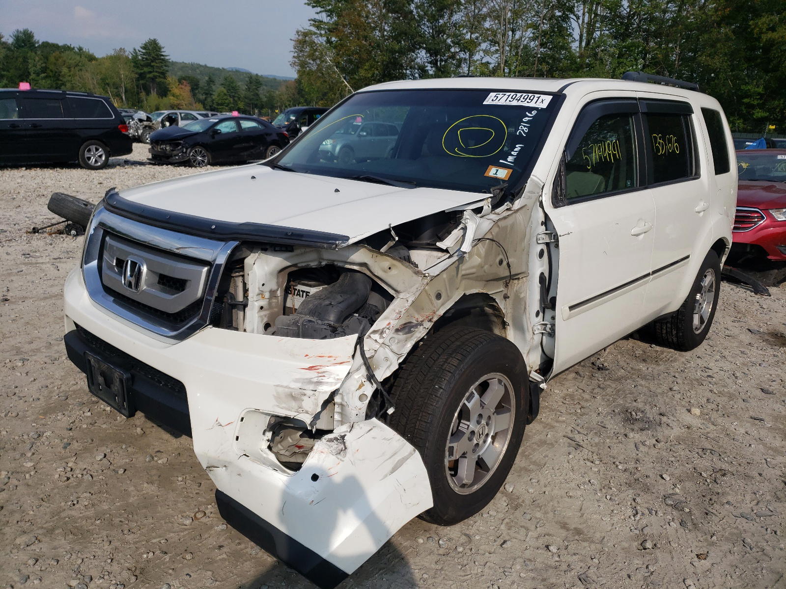Photo 2 from auction – 2011 HONDA PILOT TOUR with VIN 5FNYF4H95BB086812