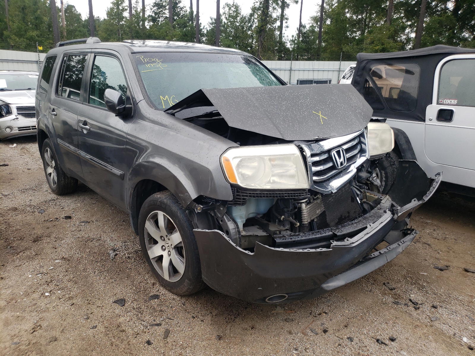 HONDA PILOT TOUR 2013 with VIN 5FNYF4H99DB076593 - Photo from auction