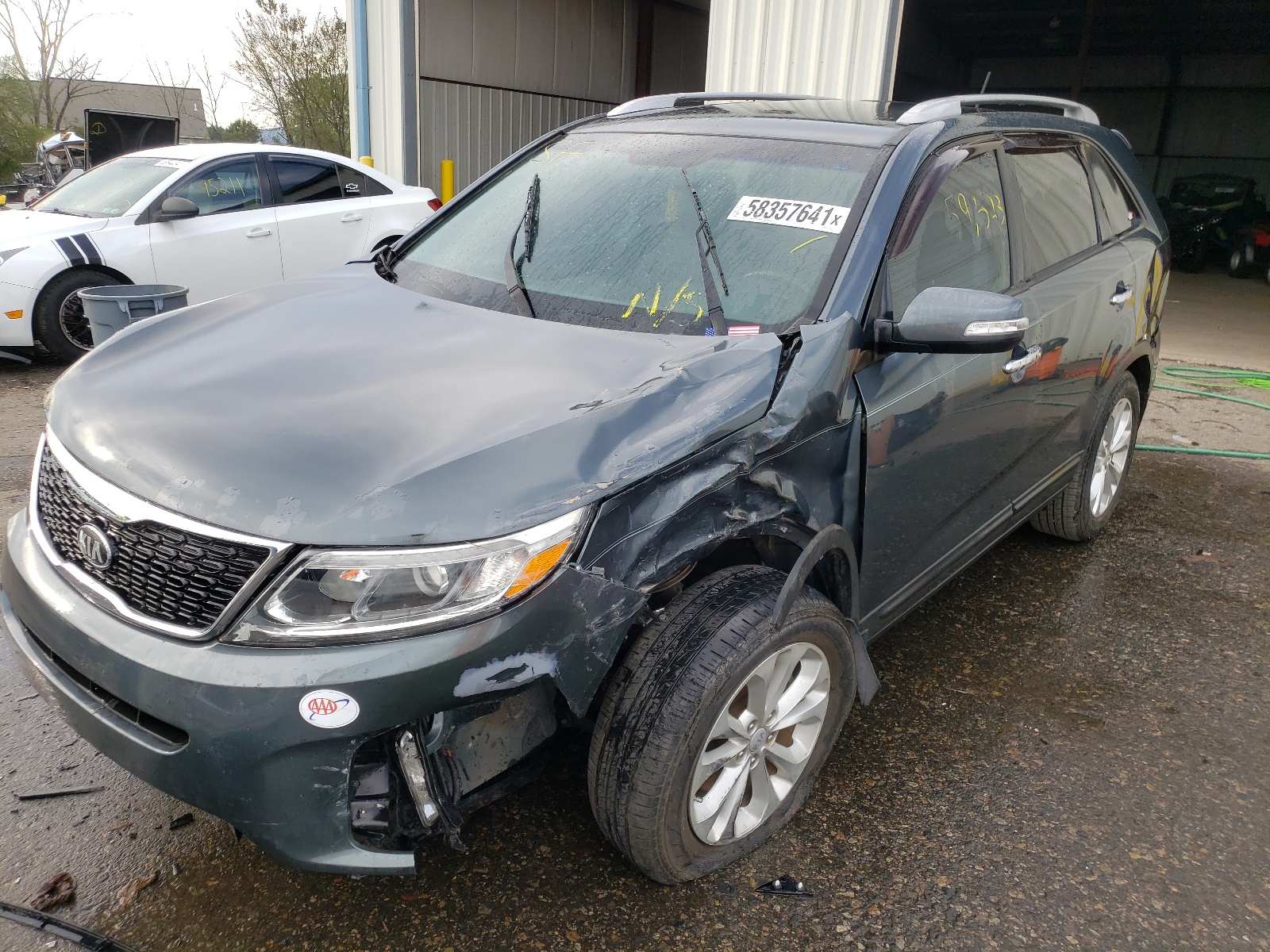 Photo 2 from auction – 2014 KIA SORENTO EX with VIN 5XYKU4A72EG437046