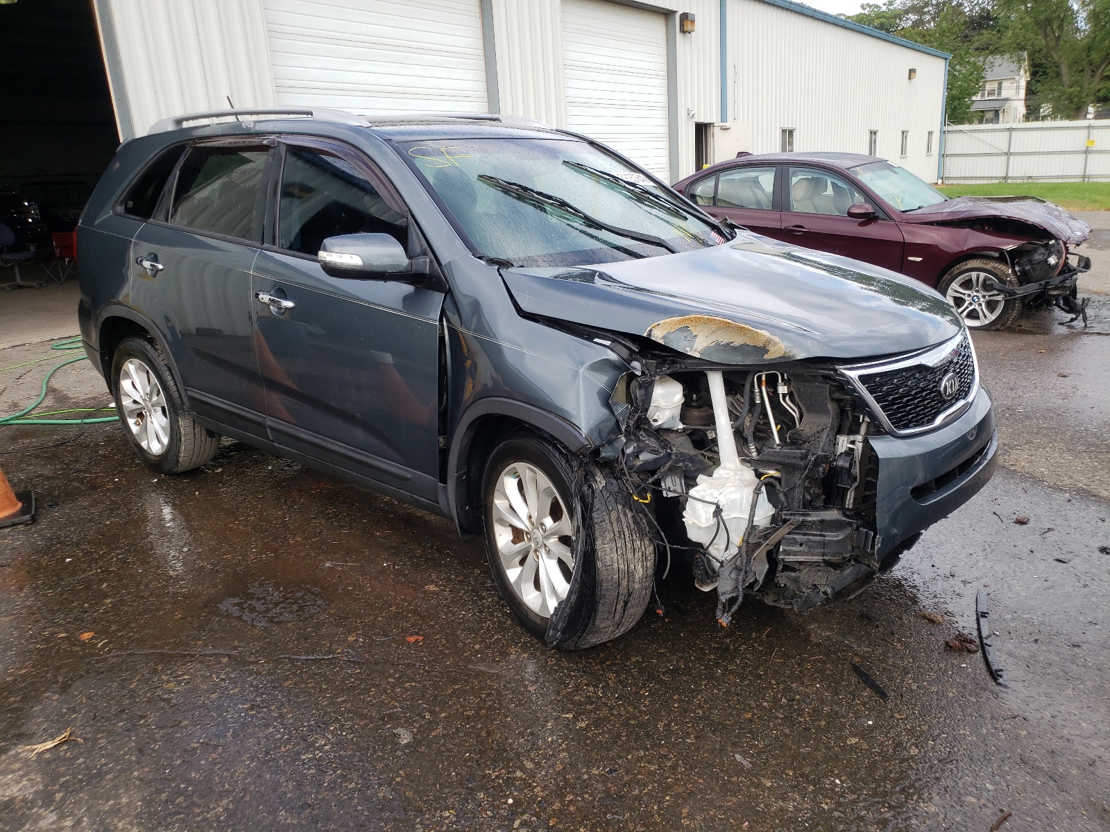 KIA SORENTO EX 2014 with VIN 5XYKU4A72EG437046 - Photo from auction