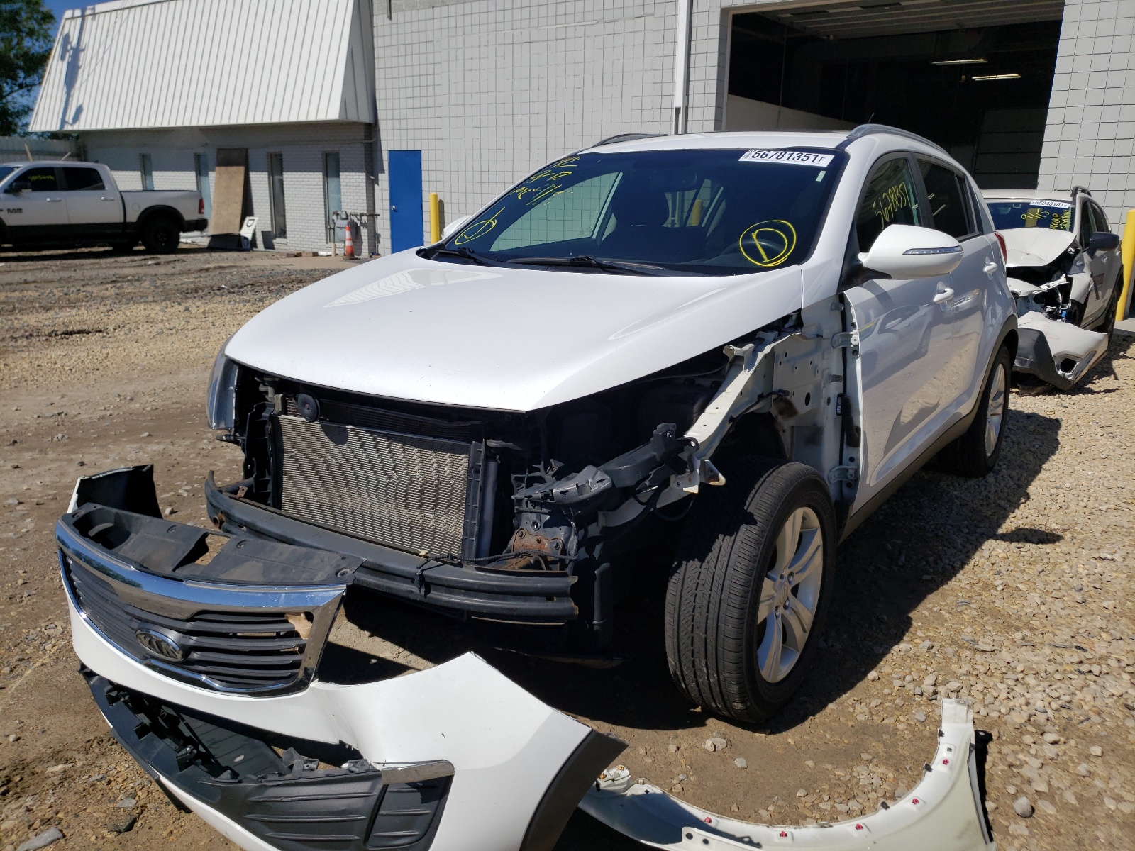 Photo 2 from auction – 2011 KIA SPORTAGE L with VIN KNDPBCA25B7079363