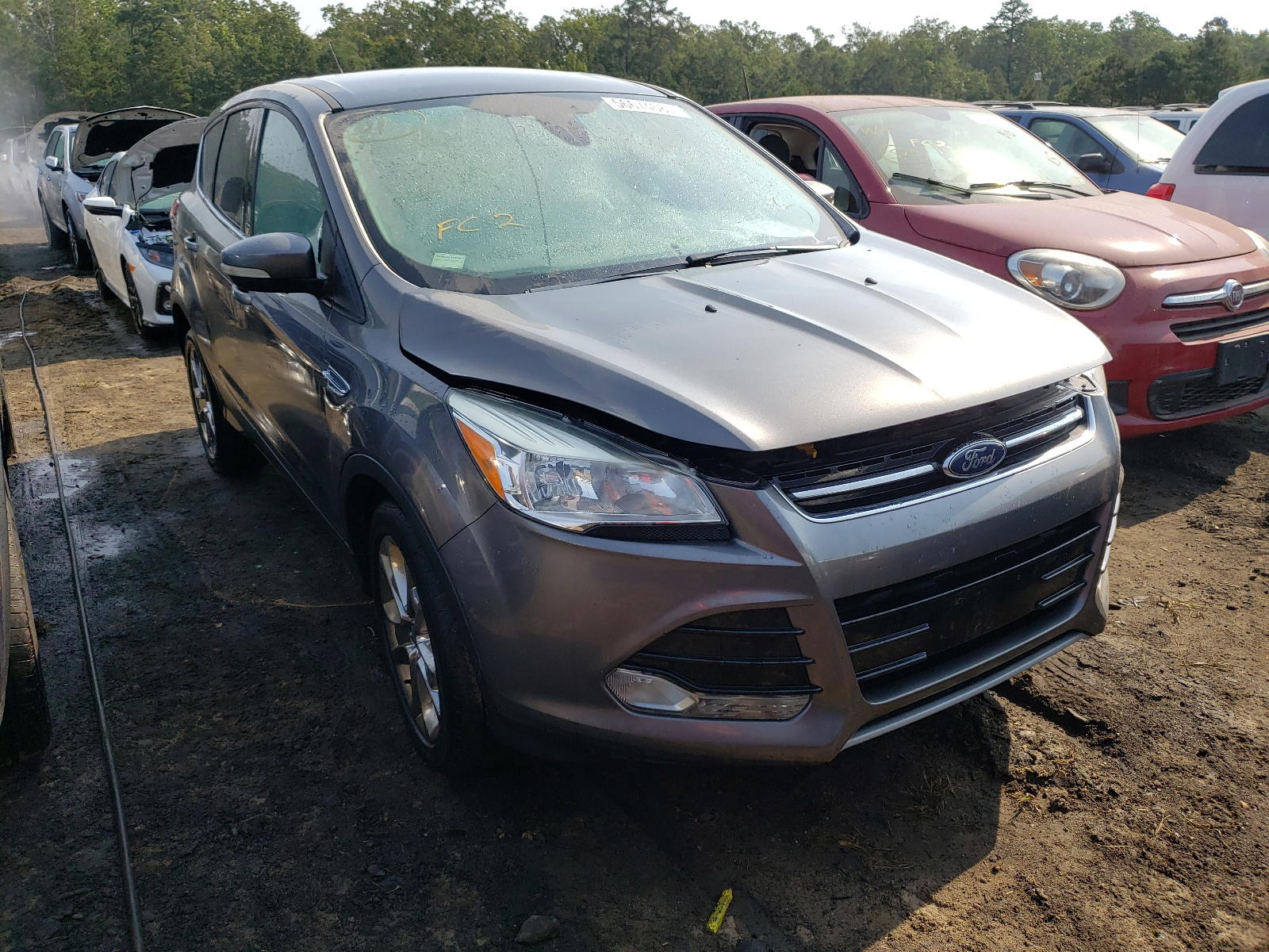FORD ESCAPE SEL 2013 with VIN 1FMCU9H99DUC40103 - Photo from auction