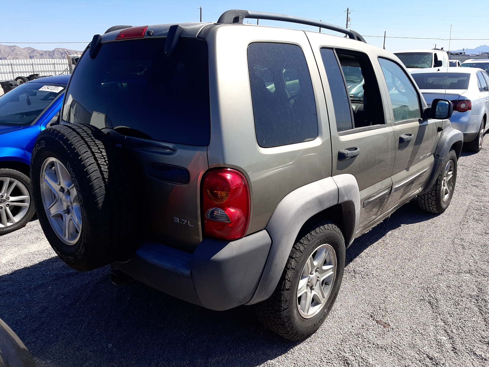 Photo 4 from auction – 2003 JEEP LIBERTY SP with VIN 1J4GL48K83W661922