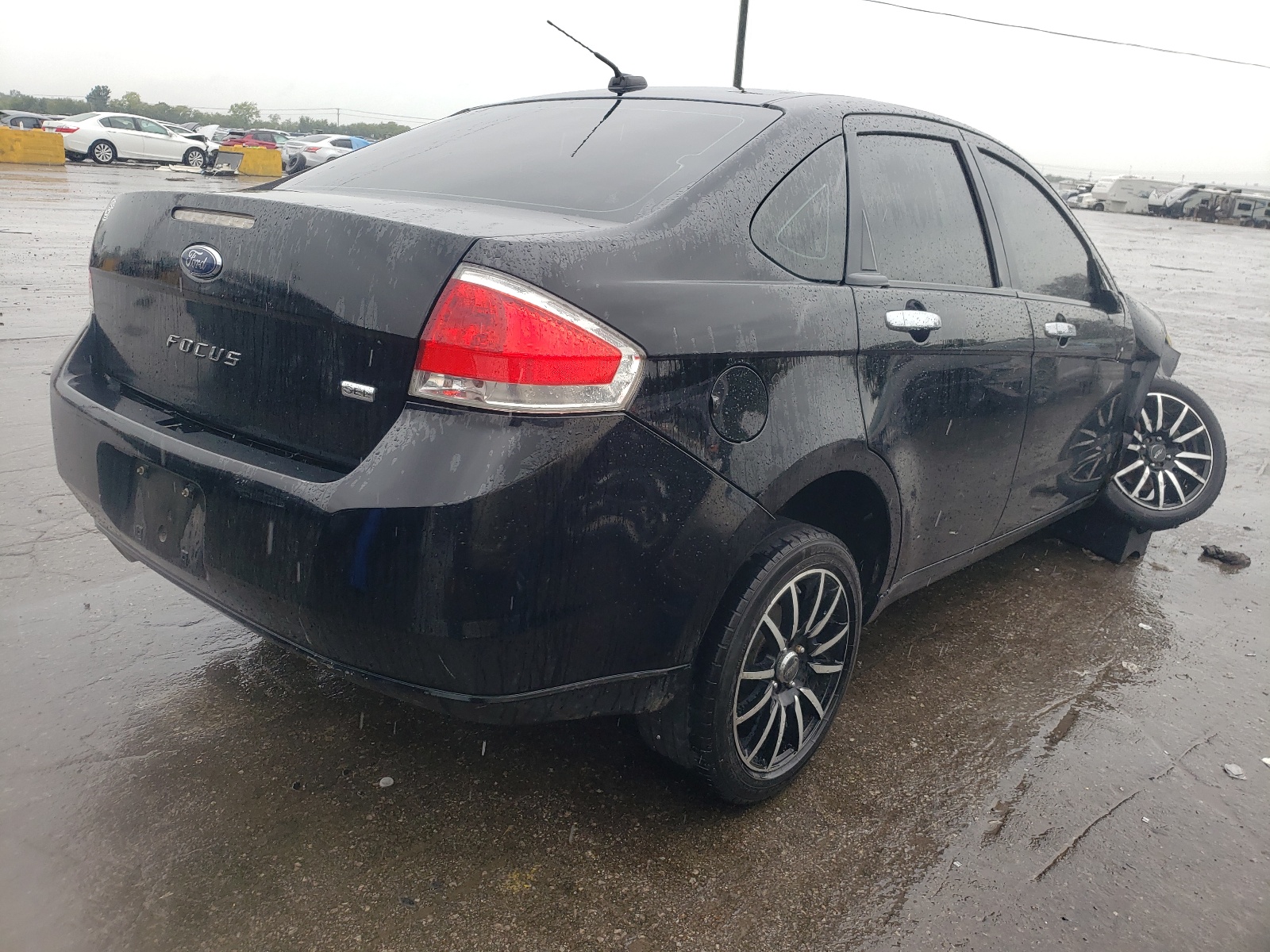 Photo 4 from auction – 2011 FORD FOCUS SEL with VIN 1FAHP3HN5BW142785