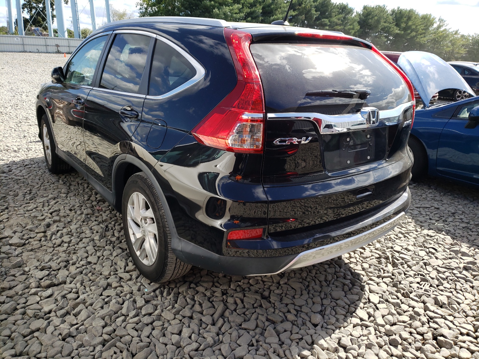 Photo 3 from auction – 2016 HONDA CR-V EXL with VIN 2HKRM4H71GH684414