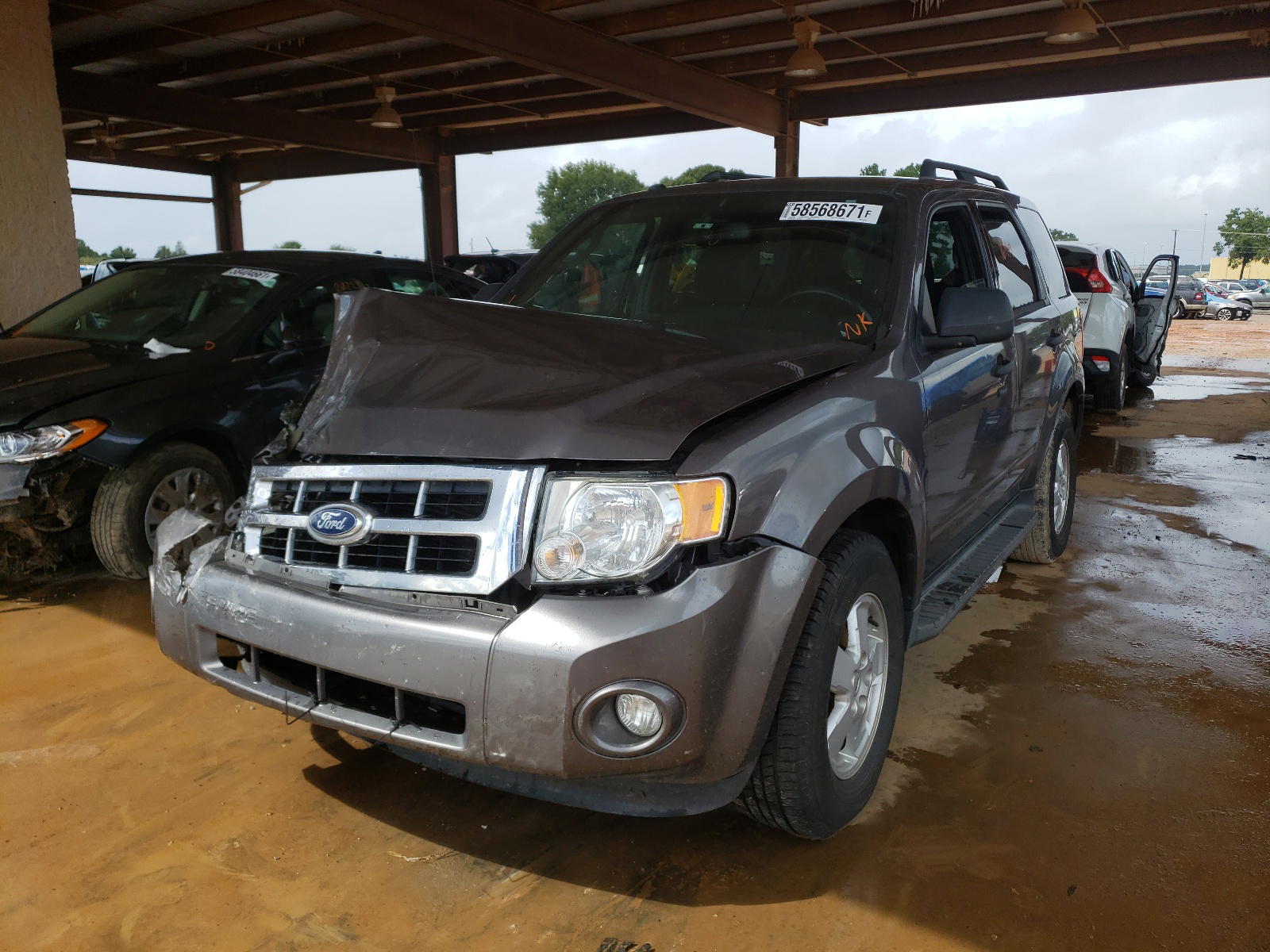 Photo 2 from auction – 2011 FORD ESCAPE XLT with VIN 1FMCU0D73BKB70218