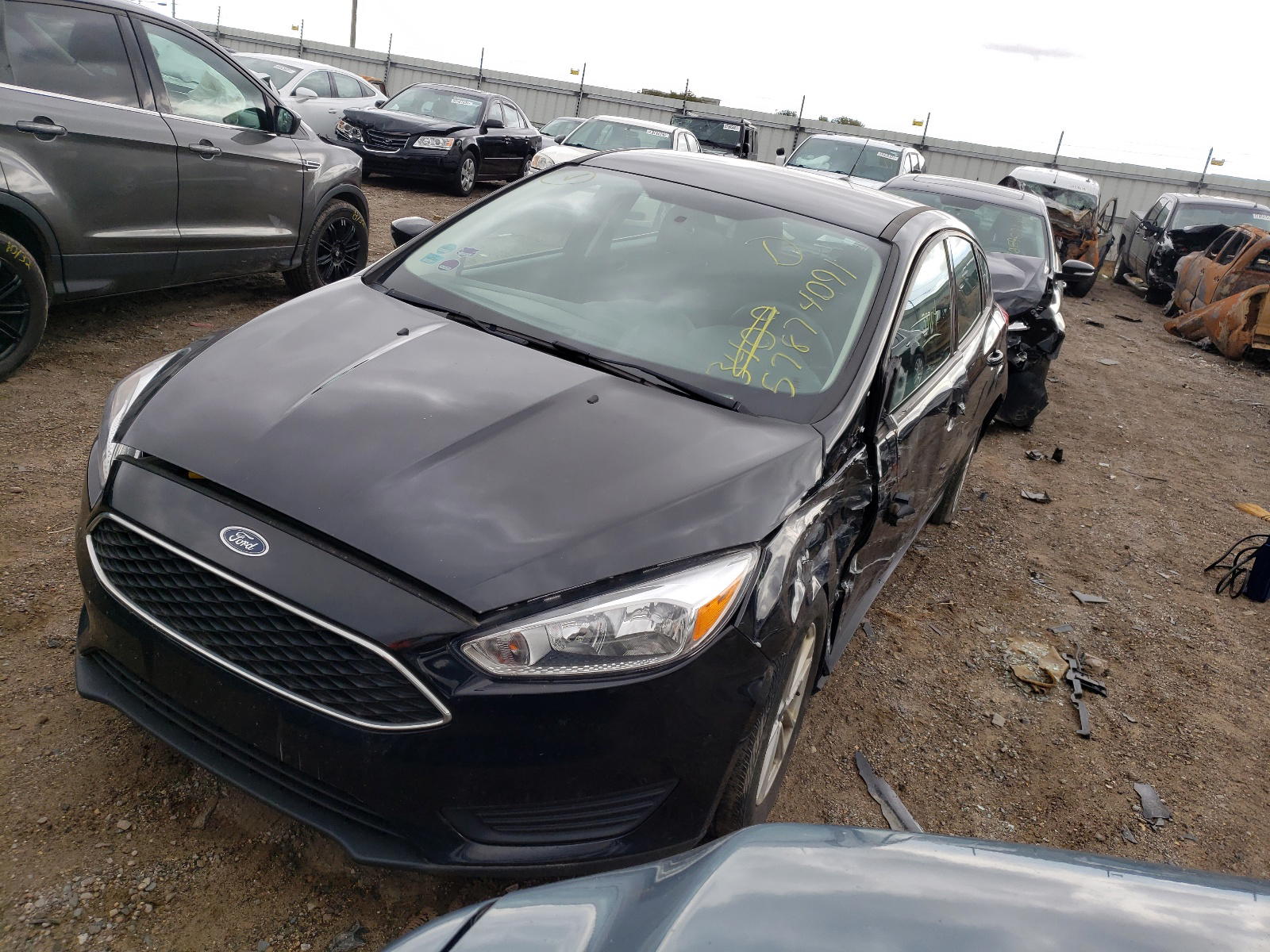 Photo 2 from auction – 2017 FORD FOCUS SE with VIN 1FADP3K29HL340969