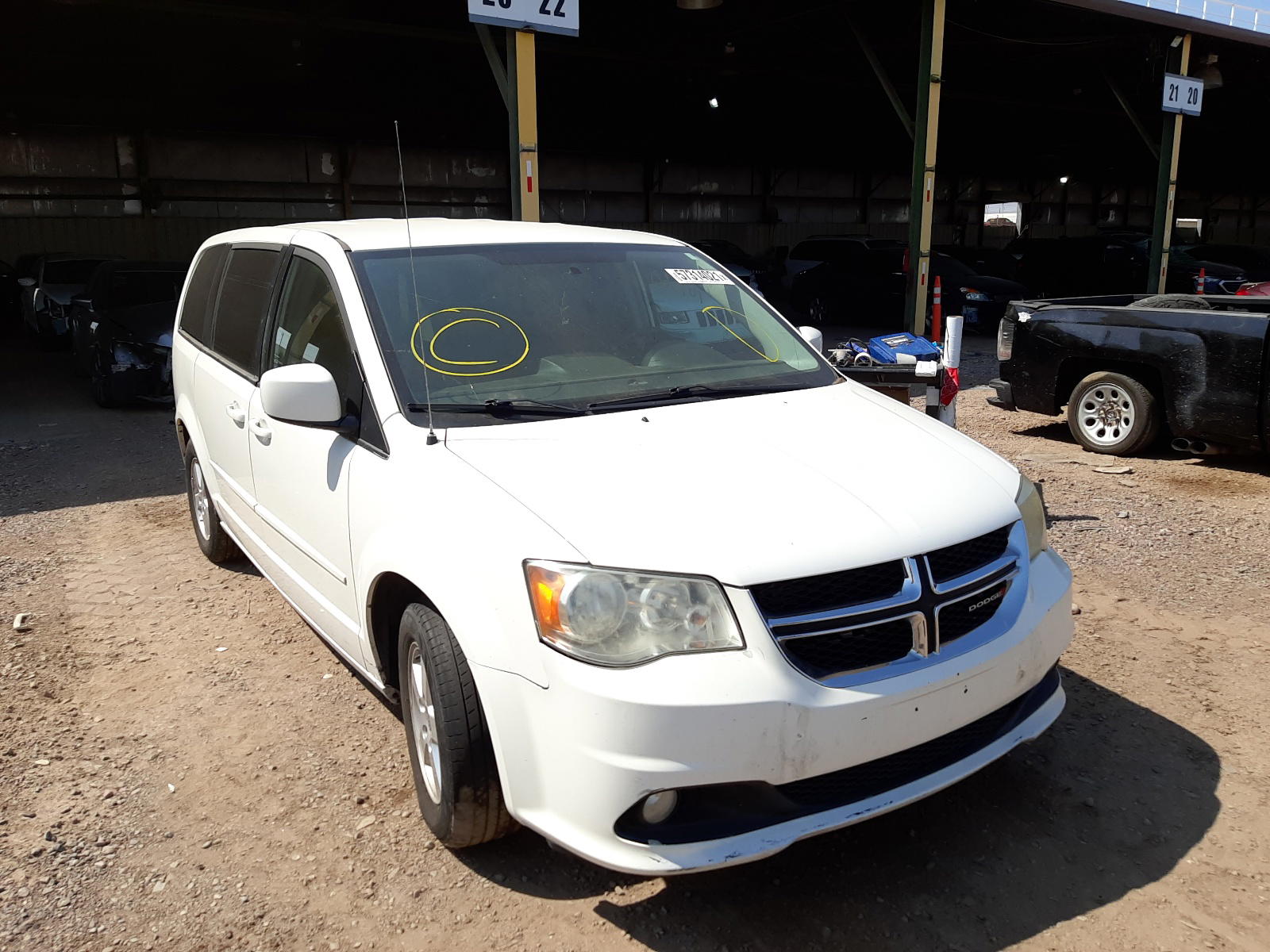 DODGE CARAVAN 2012 with VIN 2C4RDGDG9CR112947 - Photo from auction