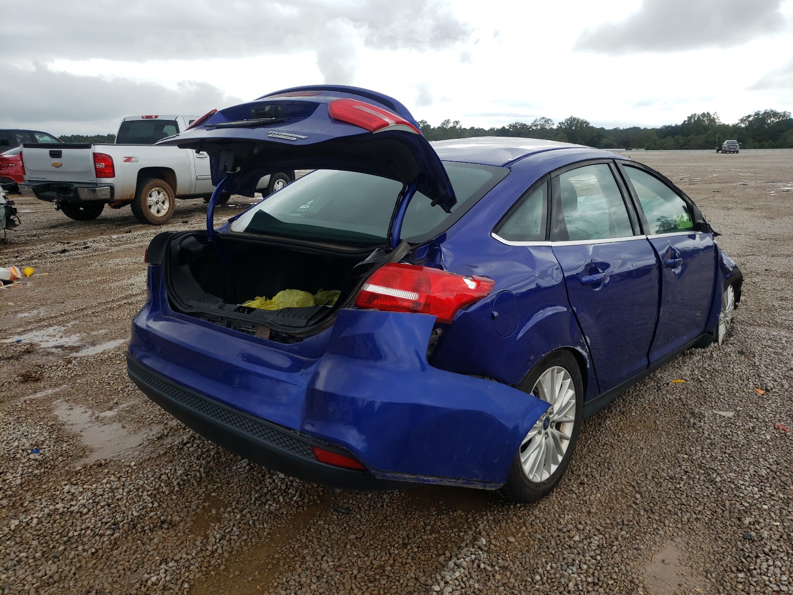 Photo 4 from auction – 2015 FORD FOCUS TITA with VIN 1FADP3J28FL368728